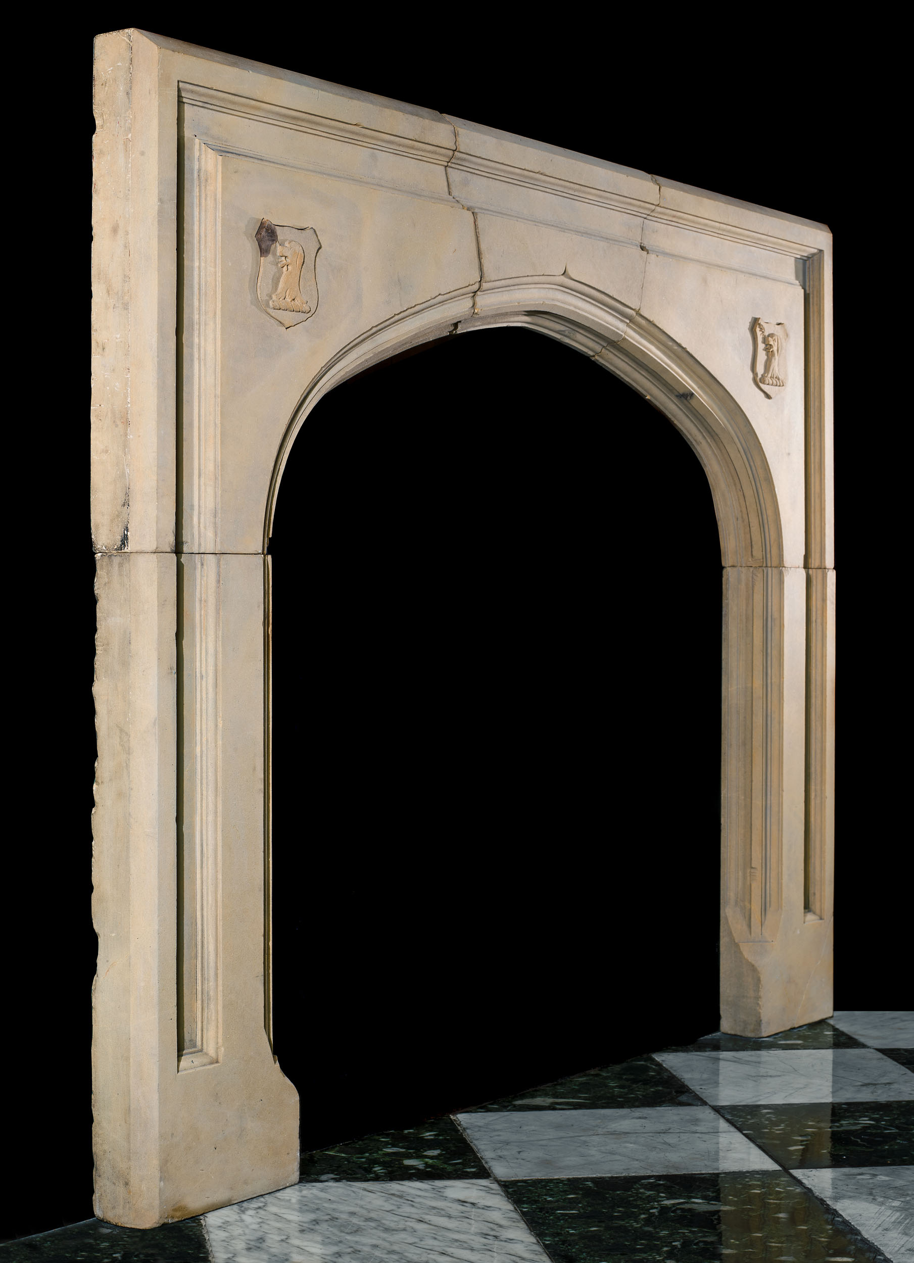 A Victorian Gothic Revival antique Yorkstone fireplace mantel
