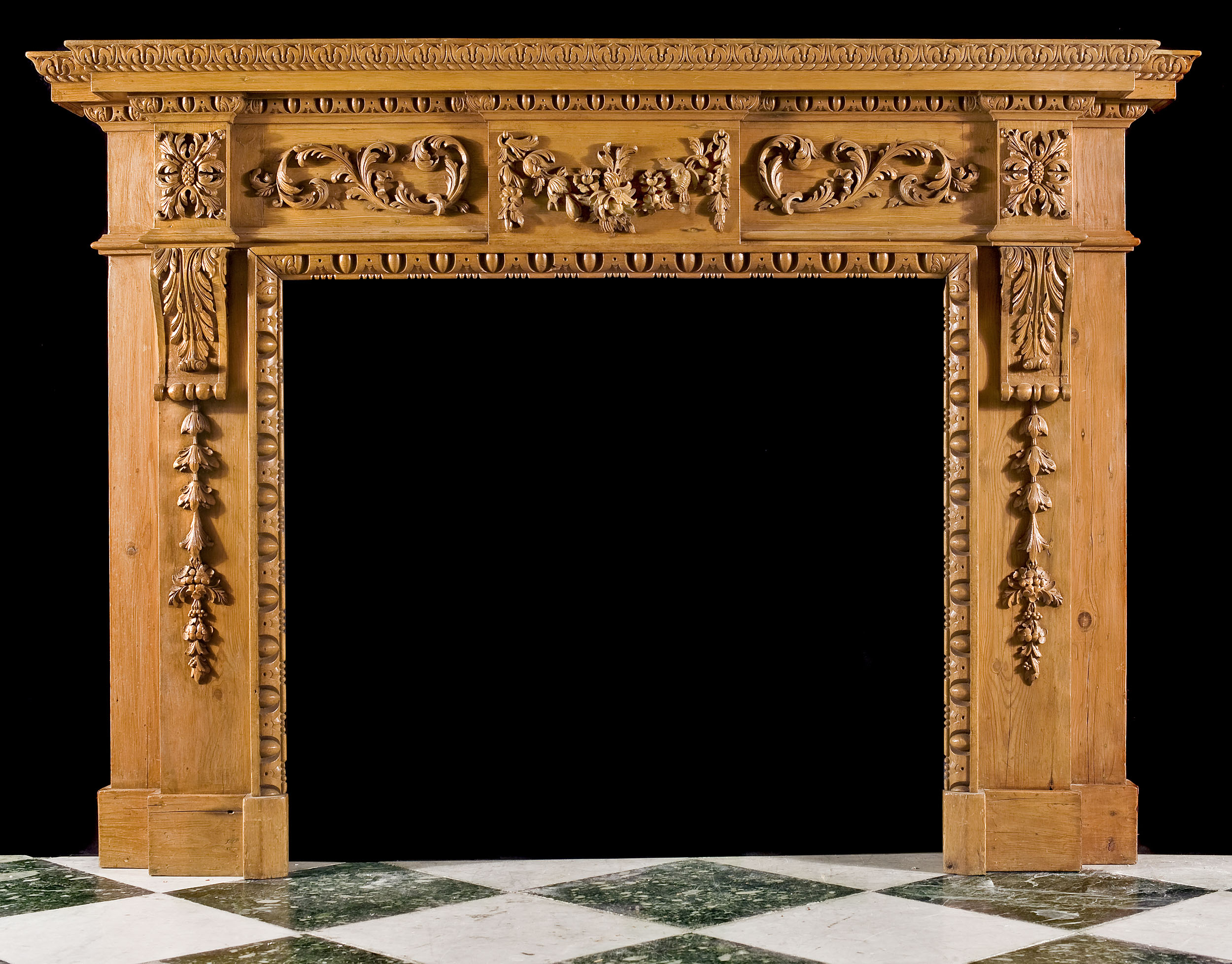 A Carved Pine Neoclassical Style Fireplace