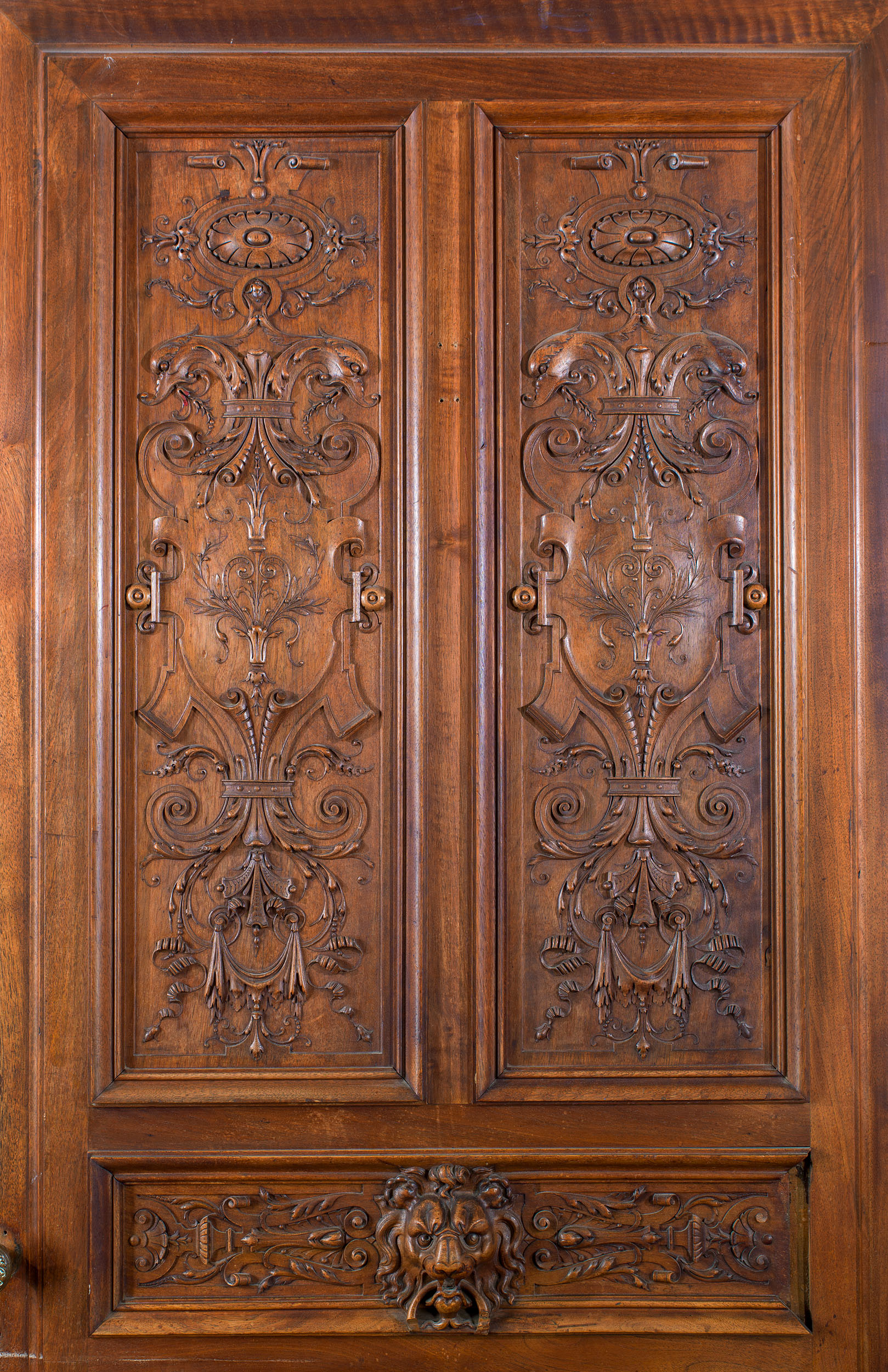 A grand pair of French walnut doors
