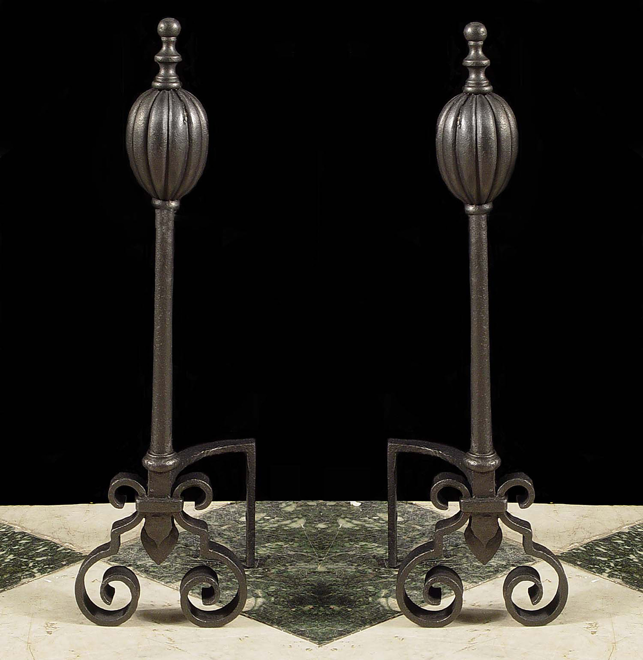 An Antique Pair of wrought Iron Andirons