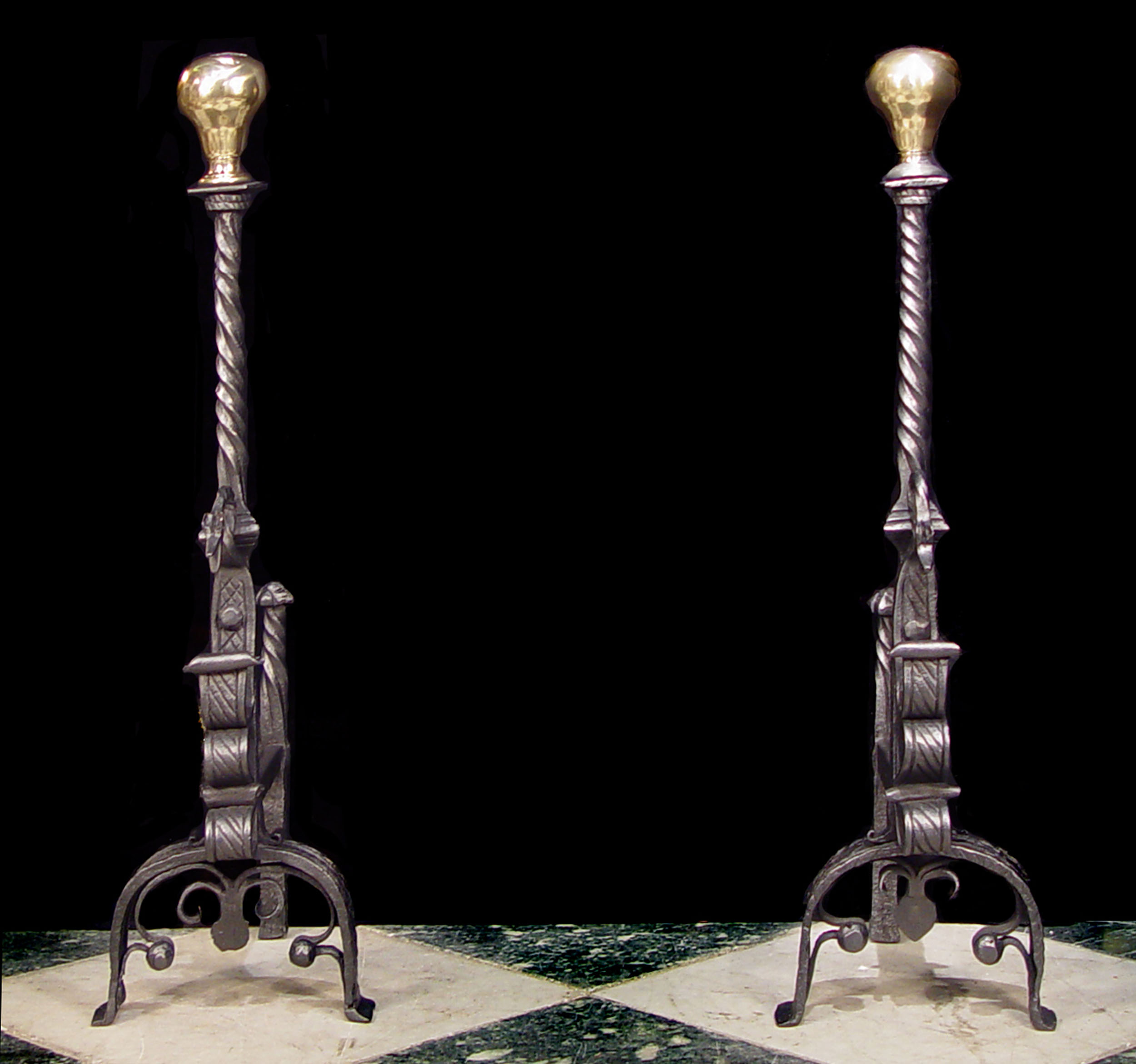 A Tall Pair of Ornate Jacobean Style Andirons