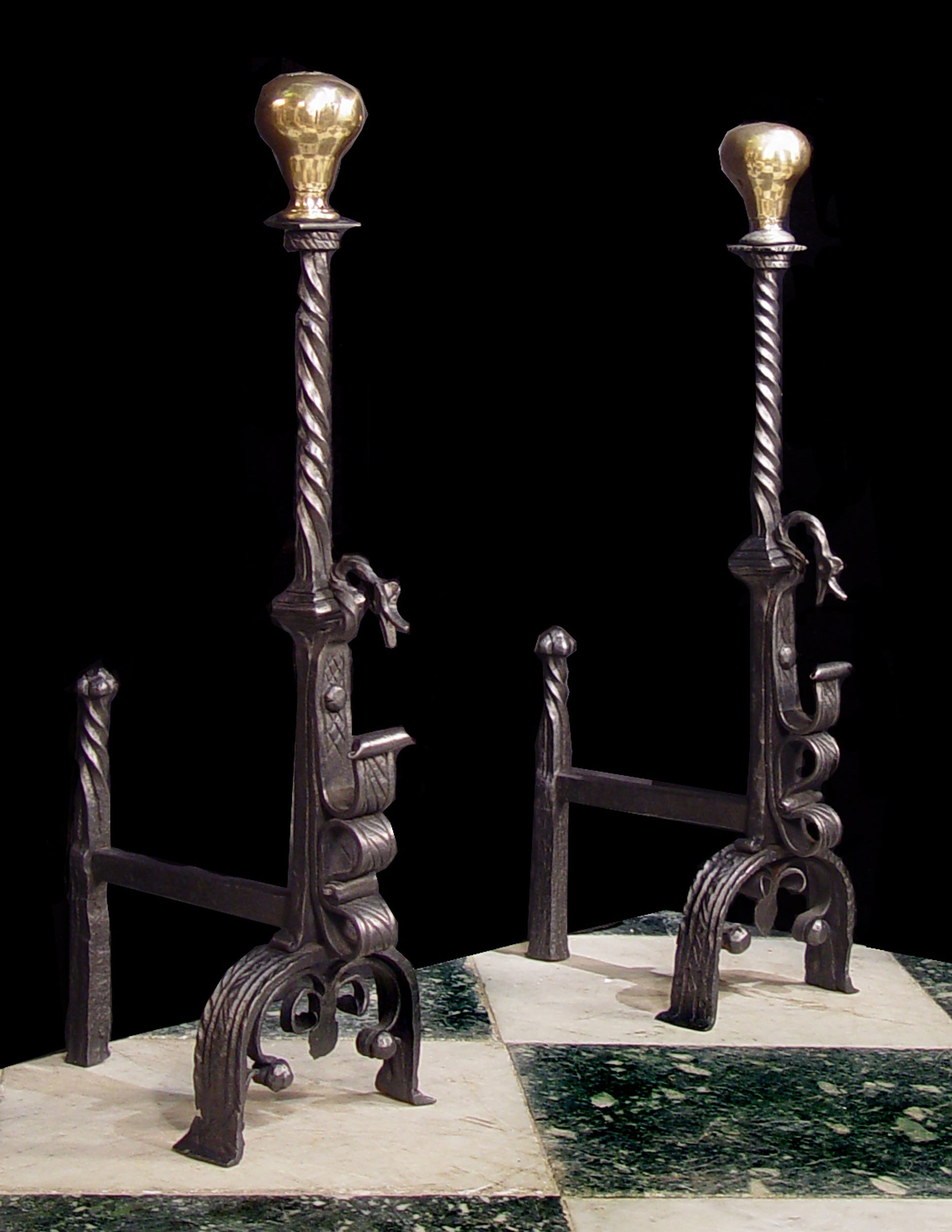 A Tall Pair of Ornate Jacobean Style Andirons