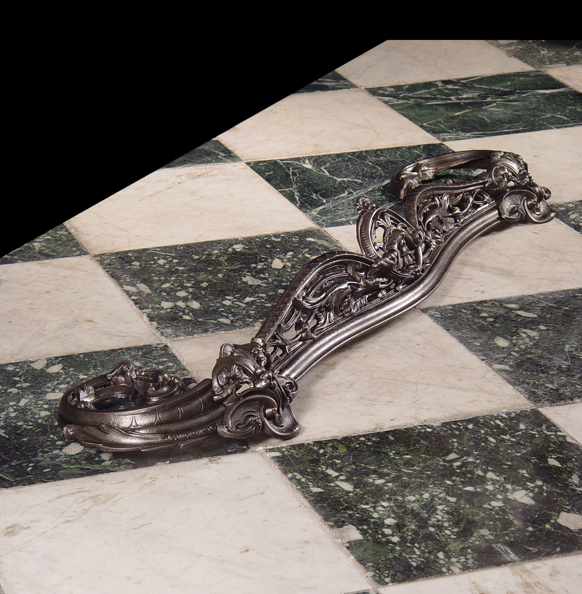 A Rococo Style Cast Iron Fireplace Fender  