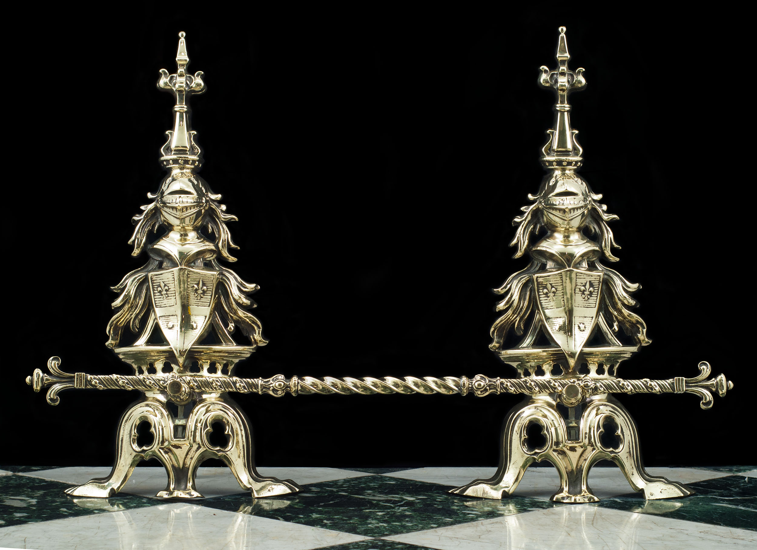 A Gothic Revival Pair of Brass Andirons 
