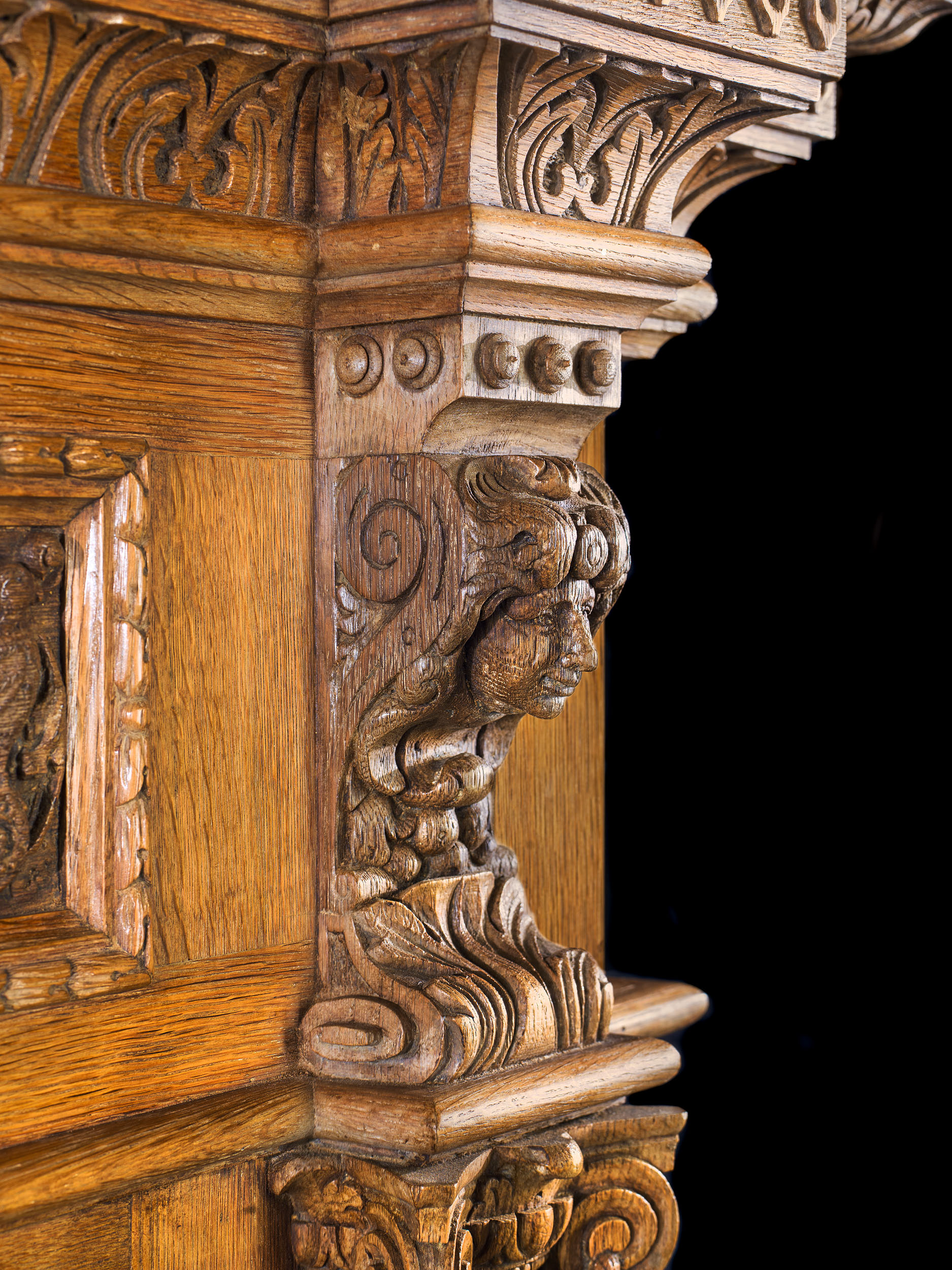 A Renaissance Style Light Oak Fireplace 

