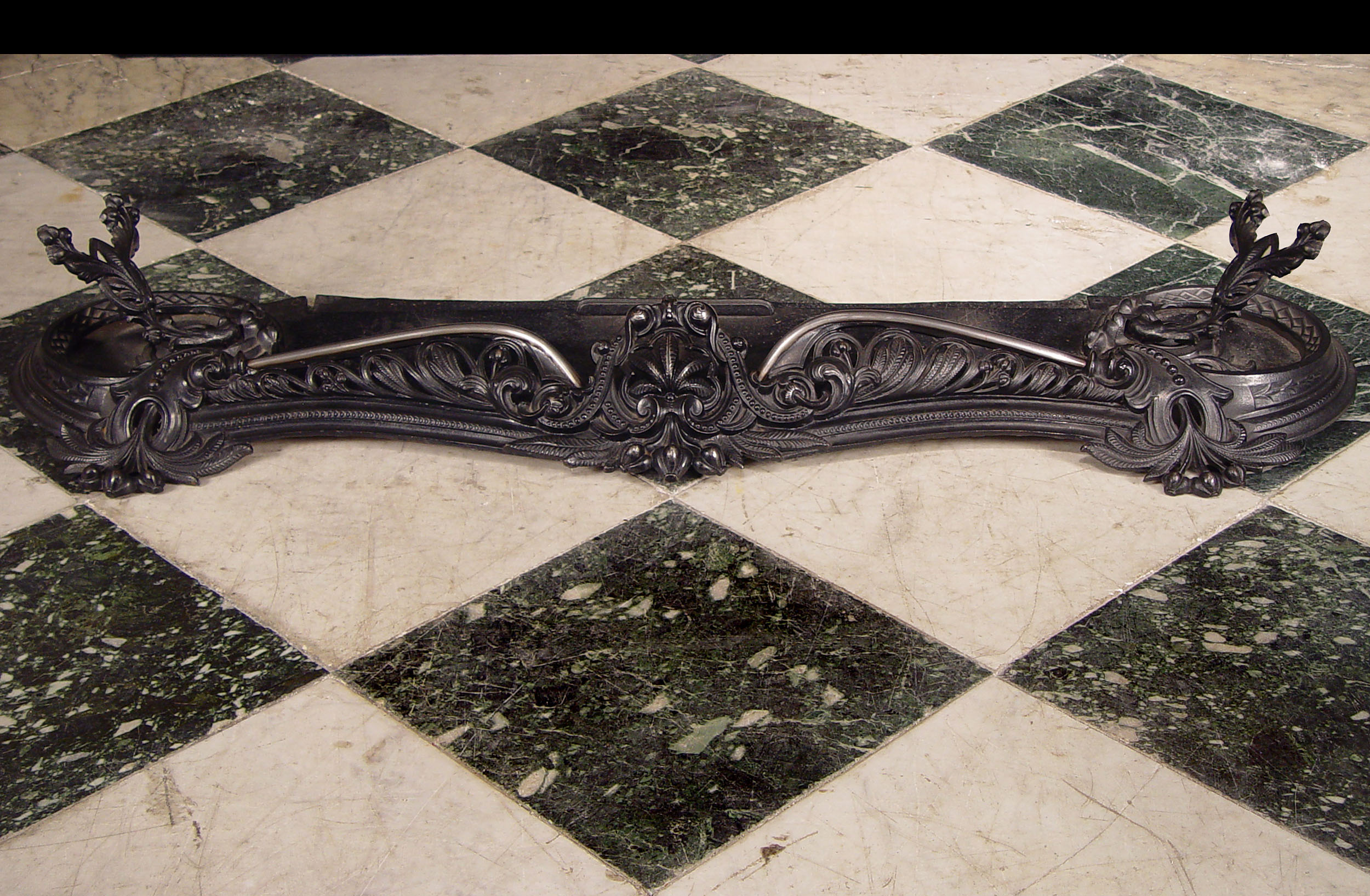 A Rococo Style Serpentine Fireplace Fender