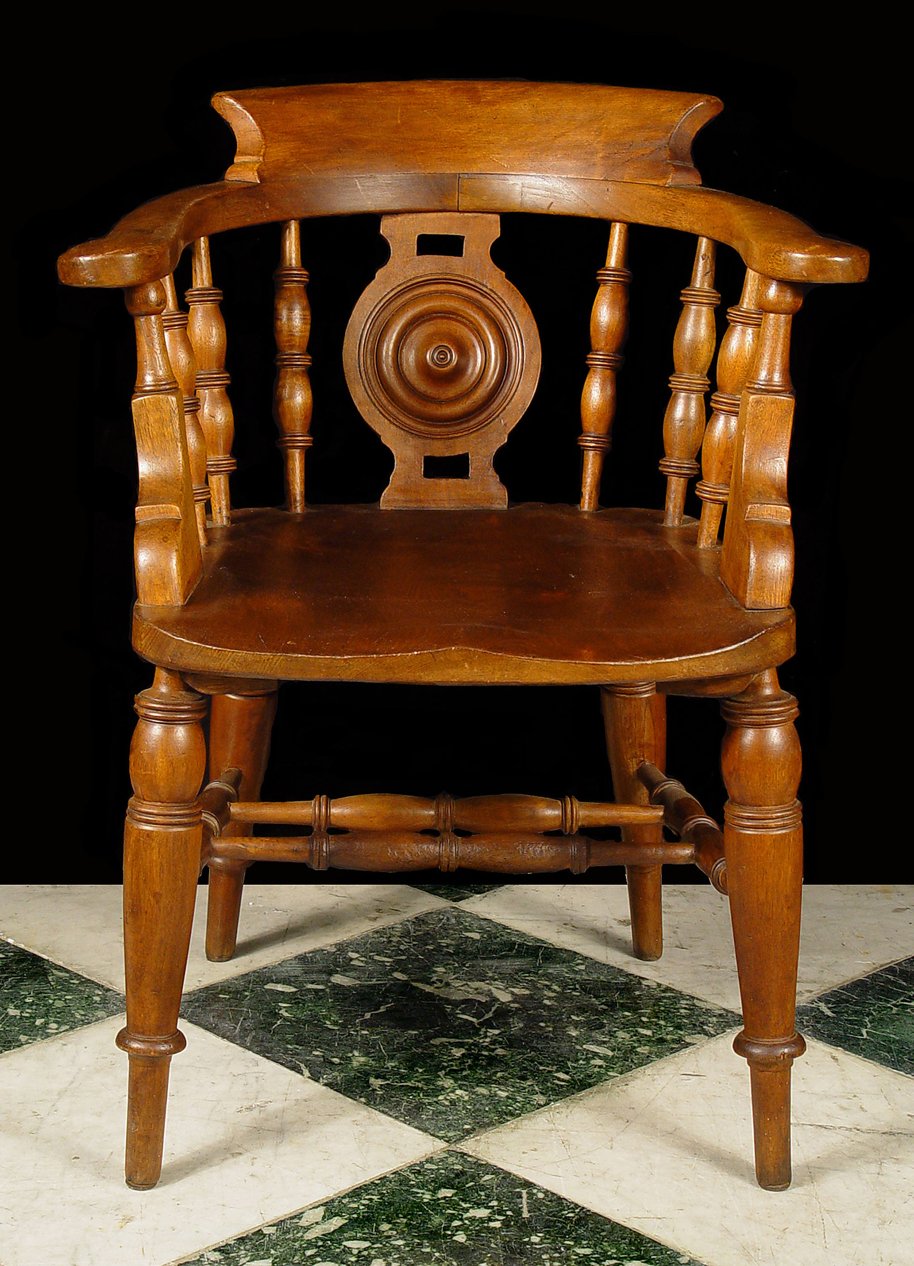 A Victorian Teak Captains Chair 
