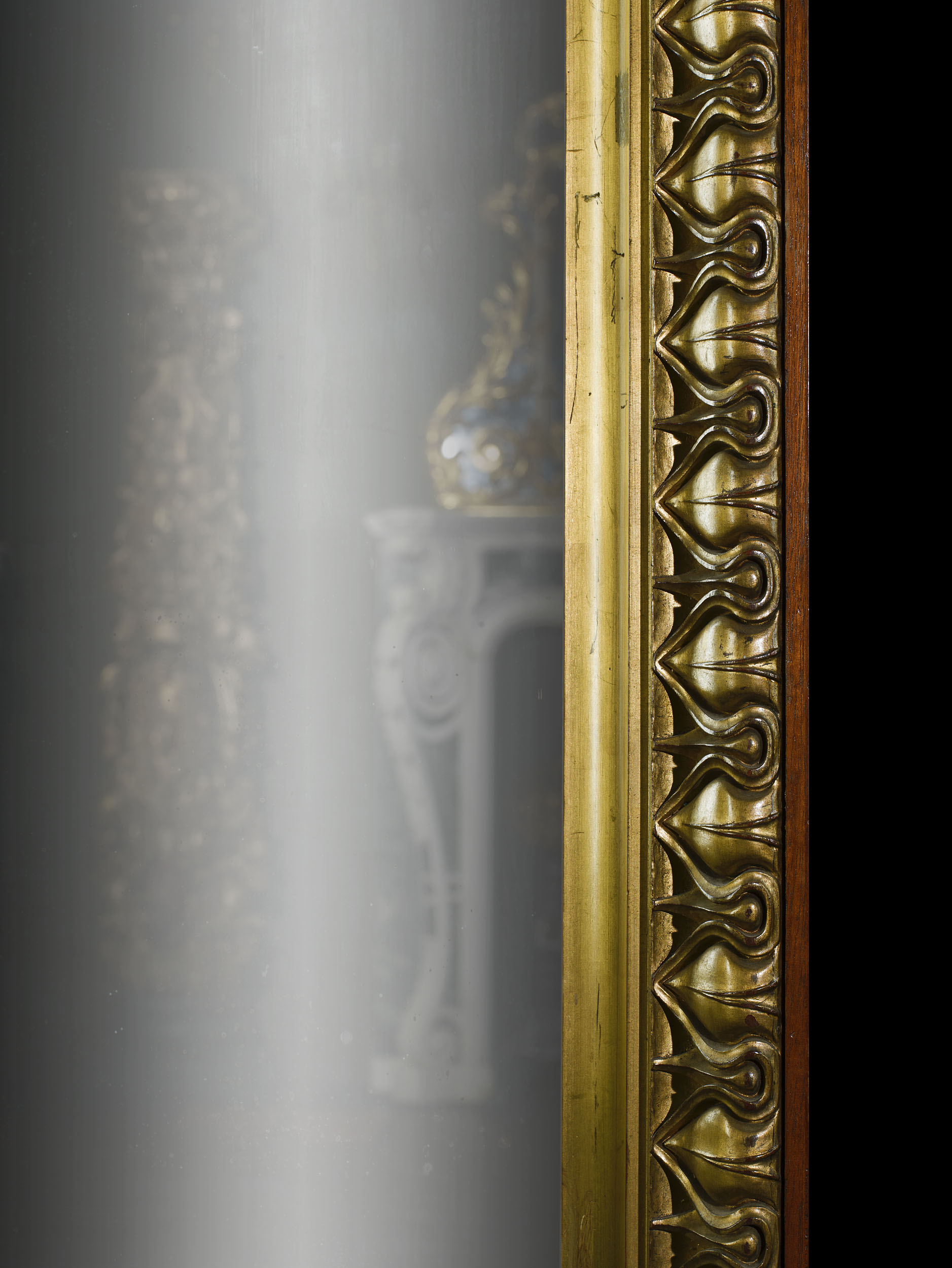 A giltwood Georgian style overmantel mirror

