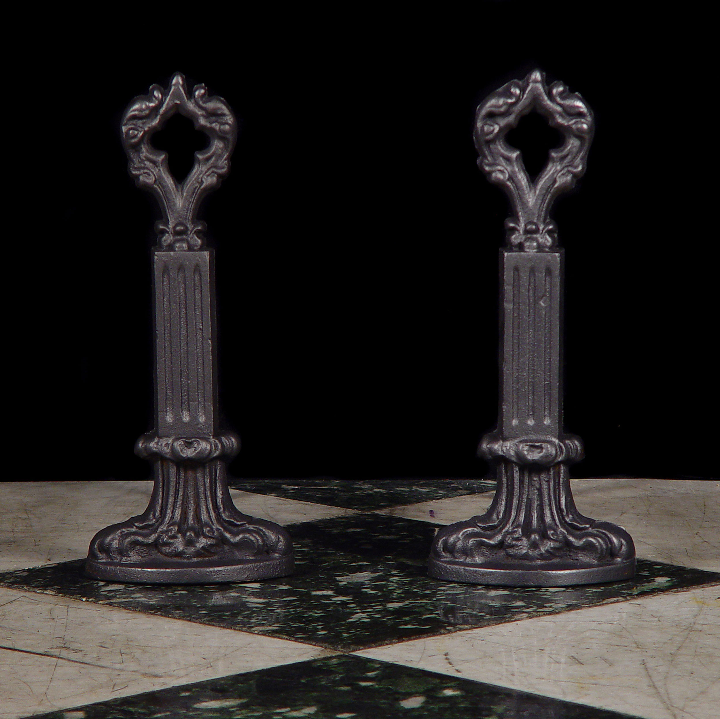 A Pair of Cast Iron Gothic Style Andirons