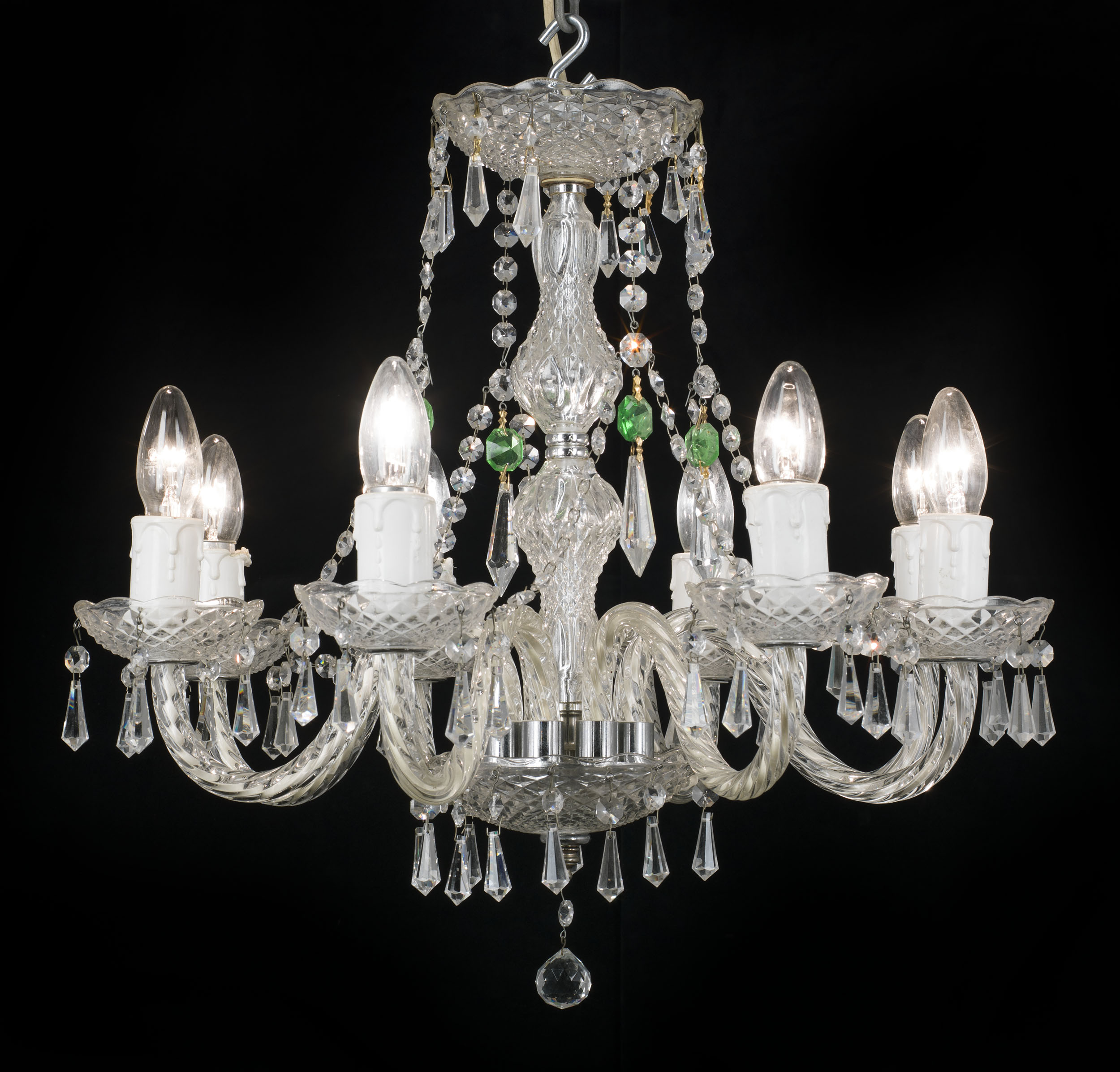 An eight branch 20th century cut and moulded glass chandelier    