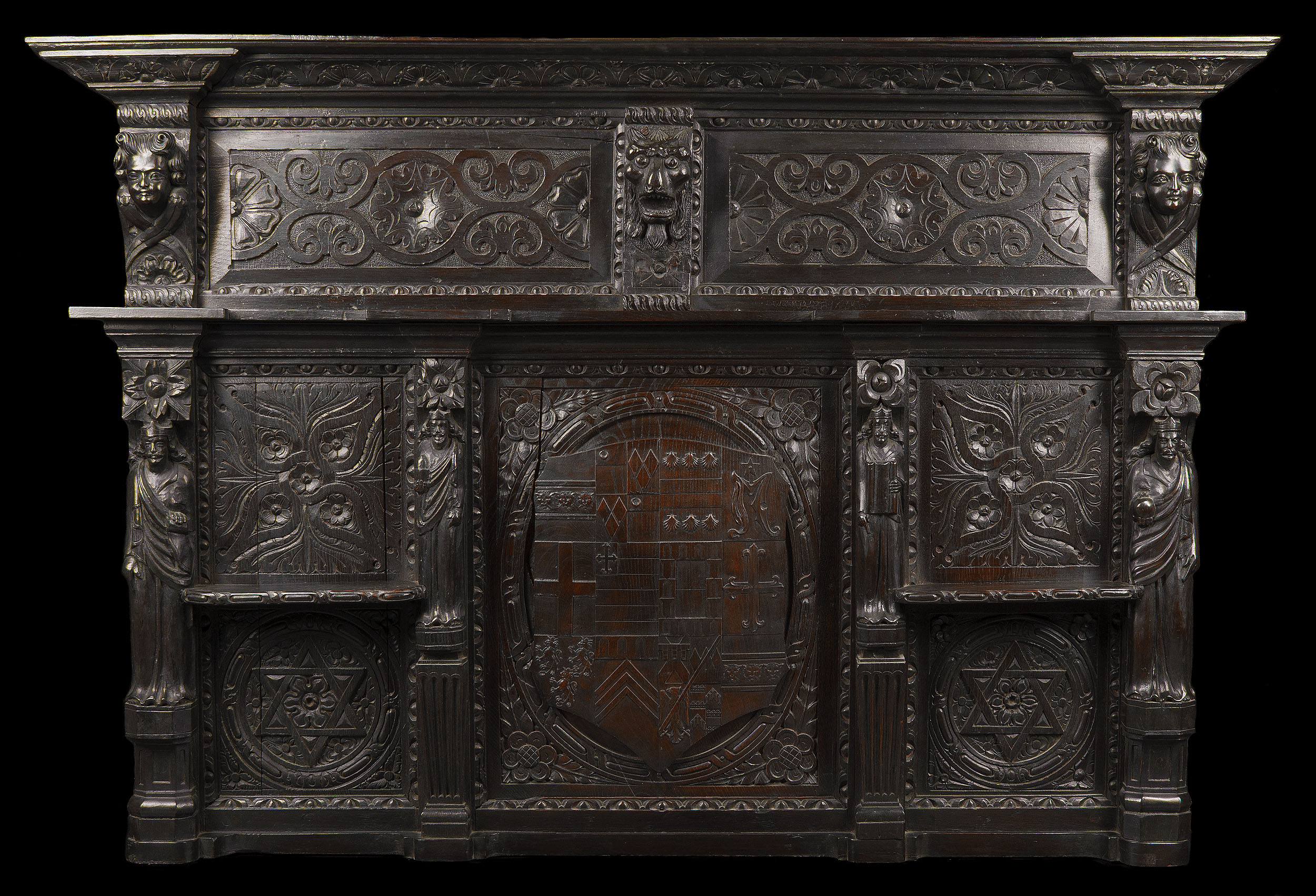 A Jacobean Style Carved Oak Overmantel 