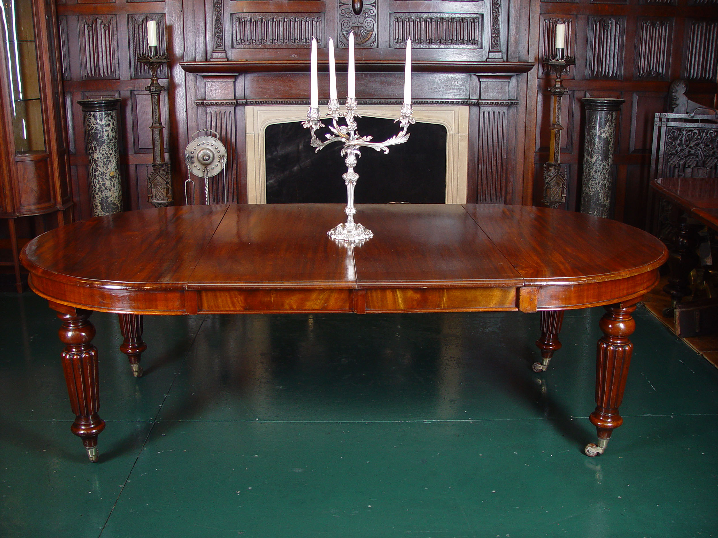 A Victorian Mahogany Extending Dining Table
