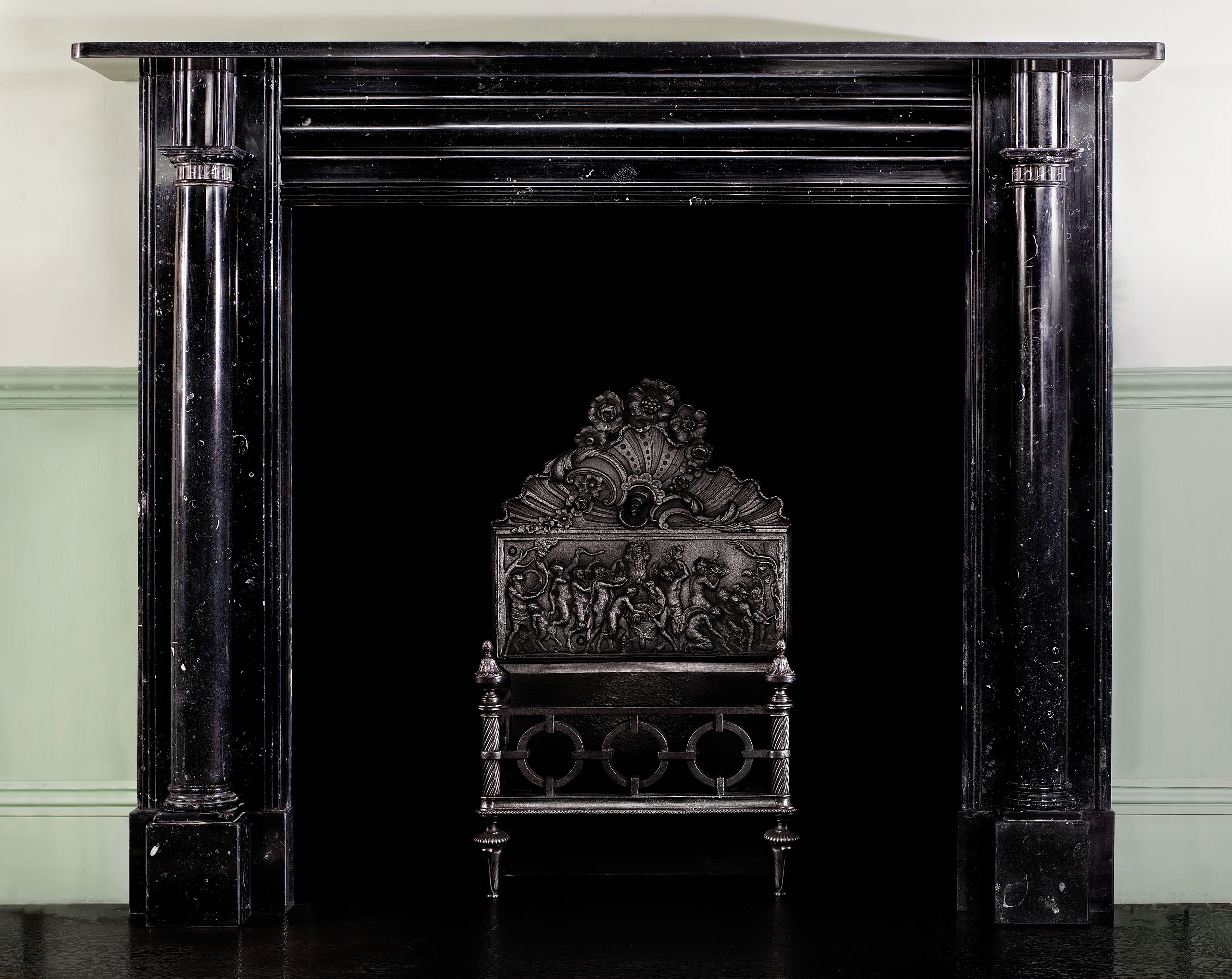 A Kilkenny Black Fossil Marble Fireplace