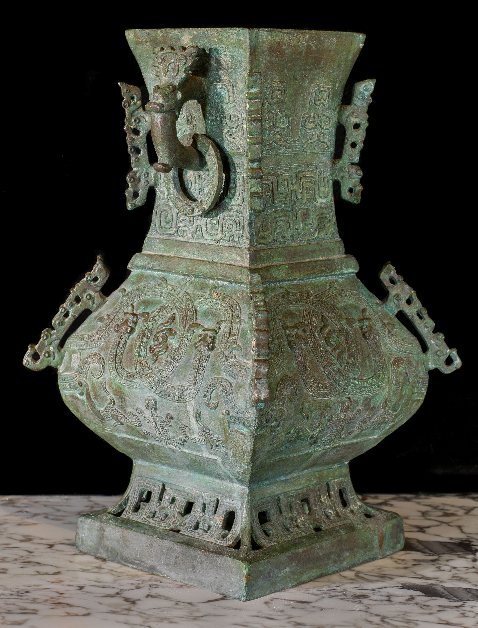 A small Shang Dynasty style bronze vase
