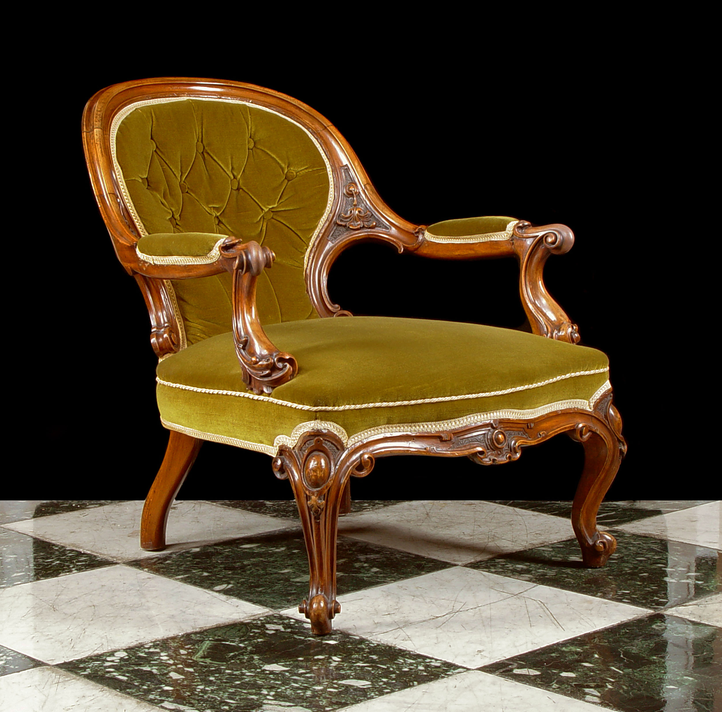 A Mahogany Victorian Spoonback Armchair