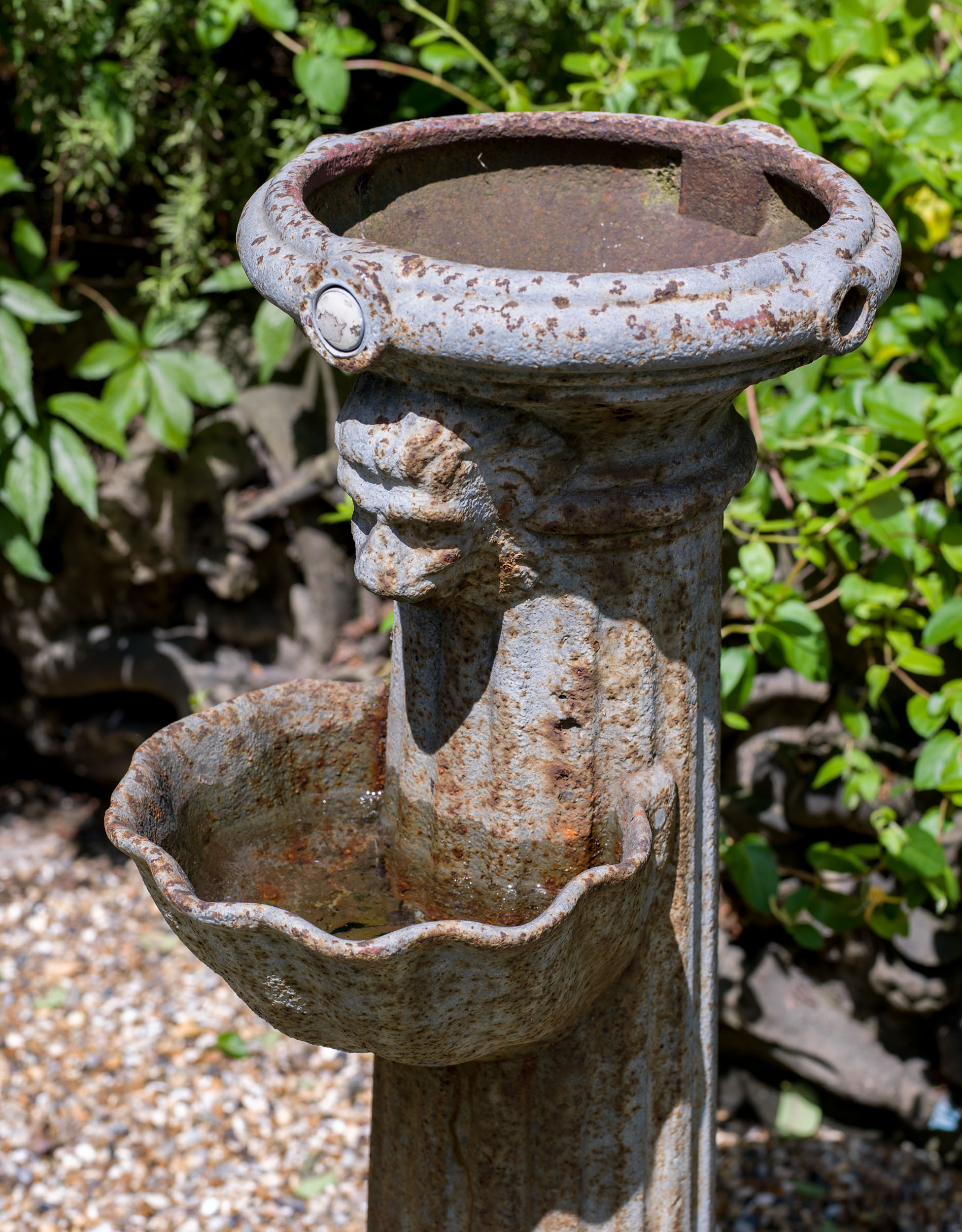 A Small Cast Iron Public Drinking Fountain