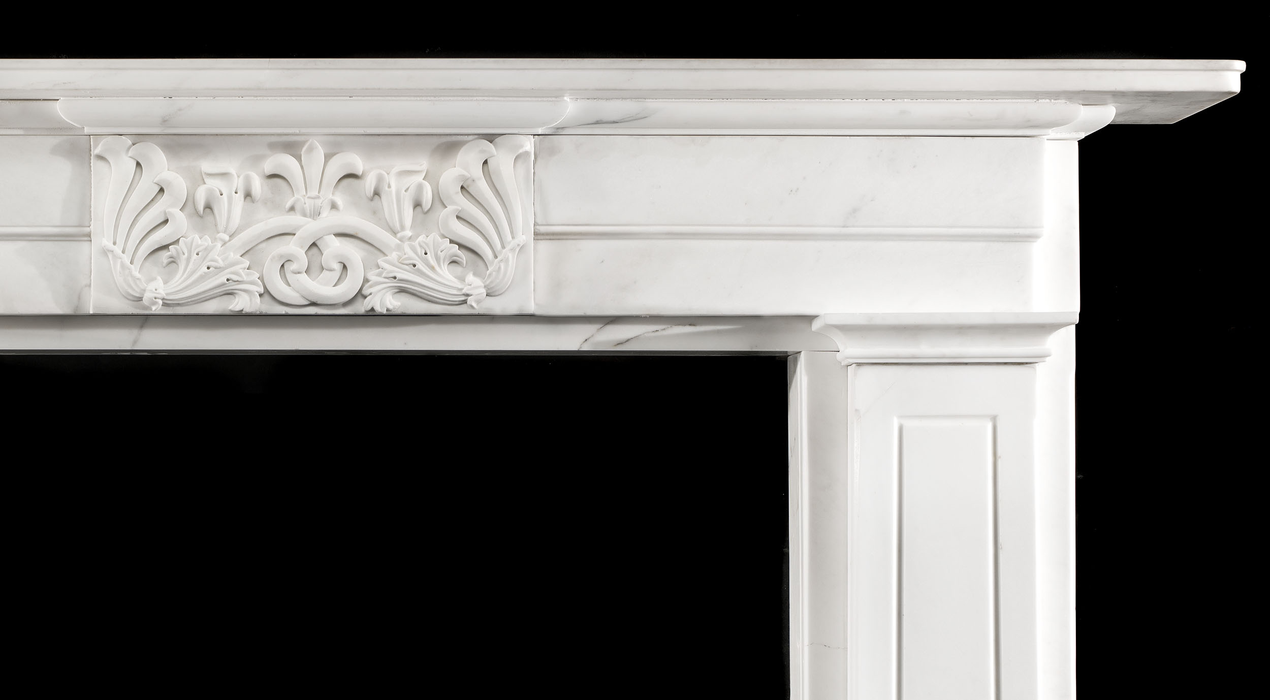 A Greek Revival Statuary Marble Fireplace