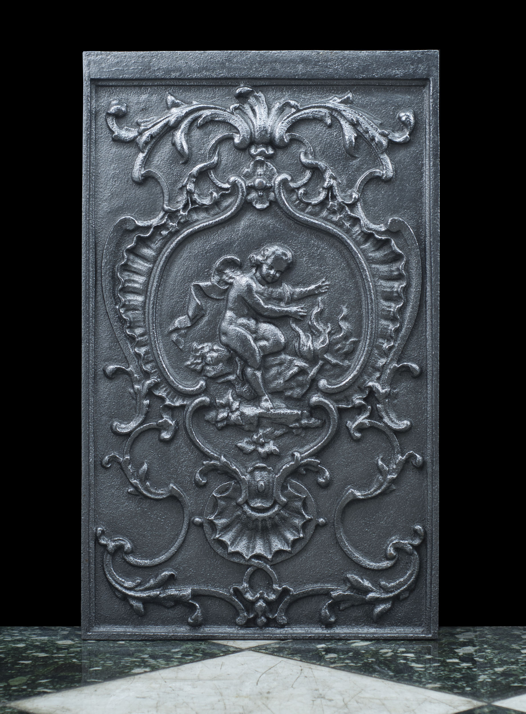 A Pair of French Cast Iron Fireplace Panels