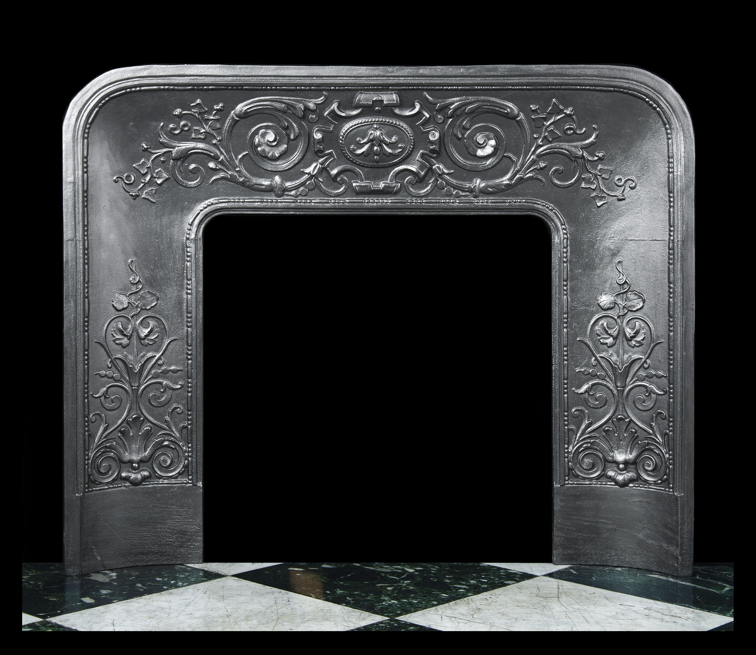 A Louis XIV Style Cast Iron Fireplace insert