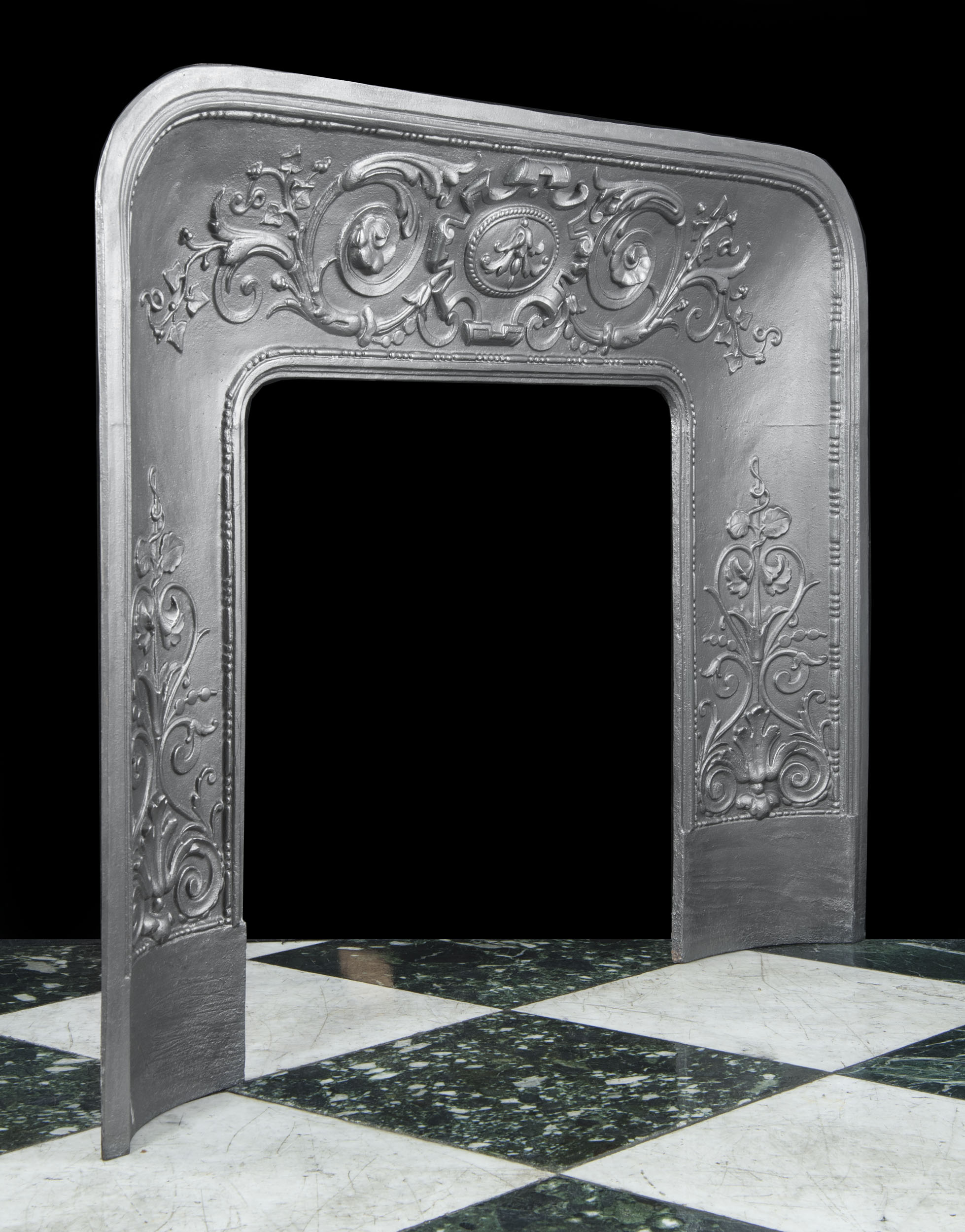 A Louis XIV Style Cast Iron Fireplace insert