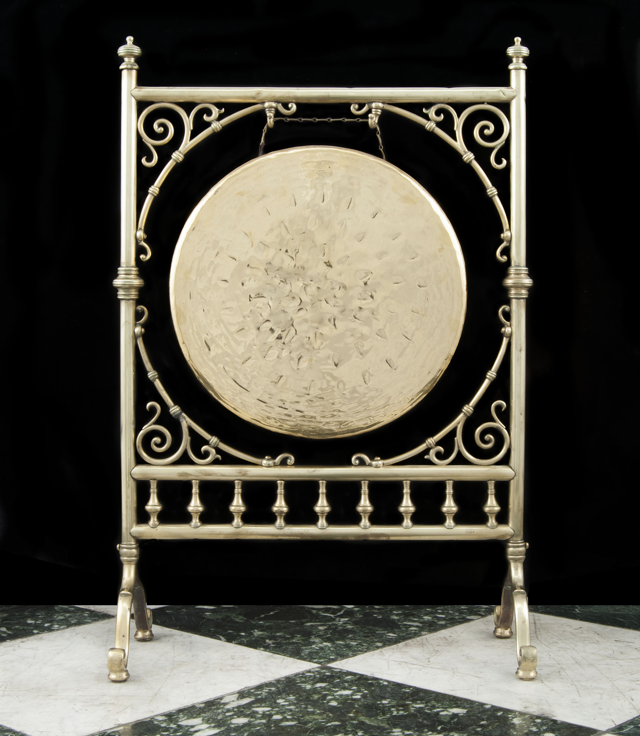A Victorian brass dinner gong