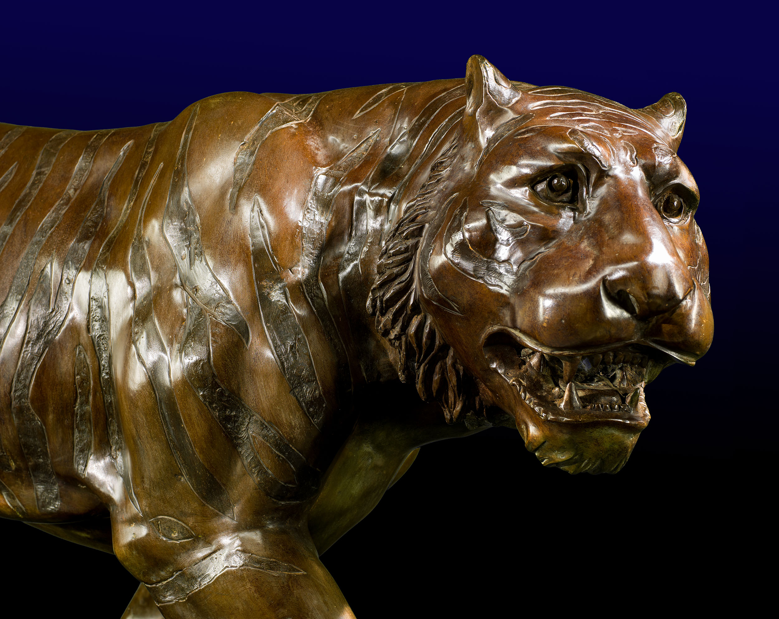 A Life Size Bronze Model of a Prowling Tiger