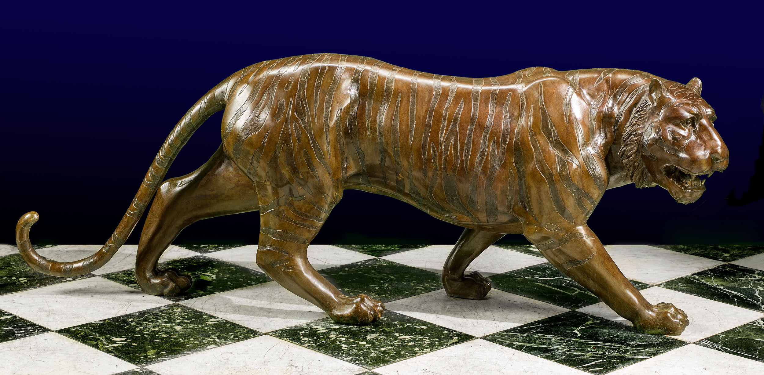 A Life Size Bronze Model of a Prowling Tiger
