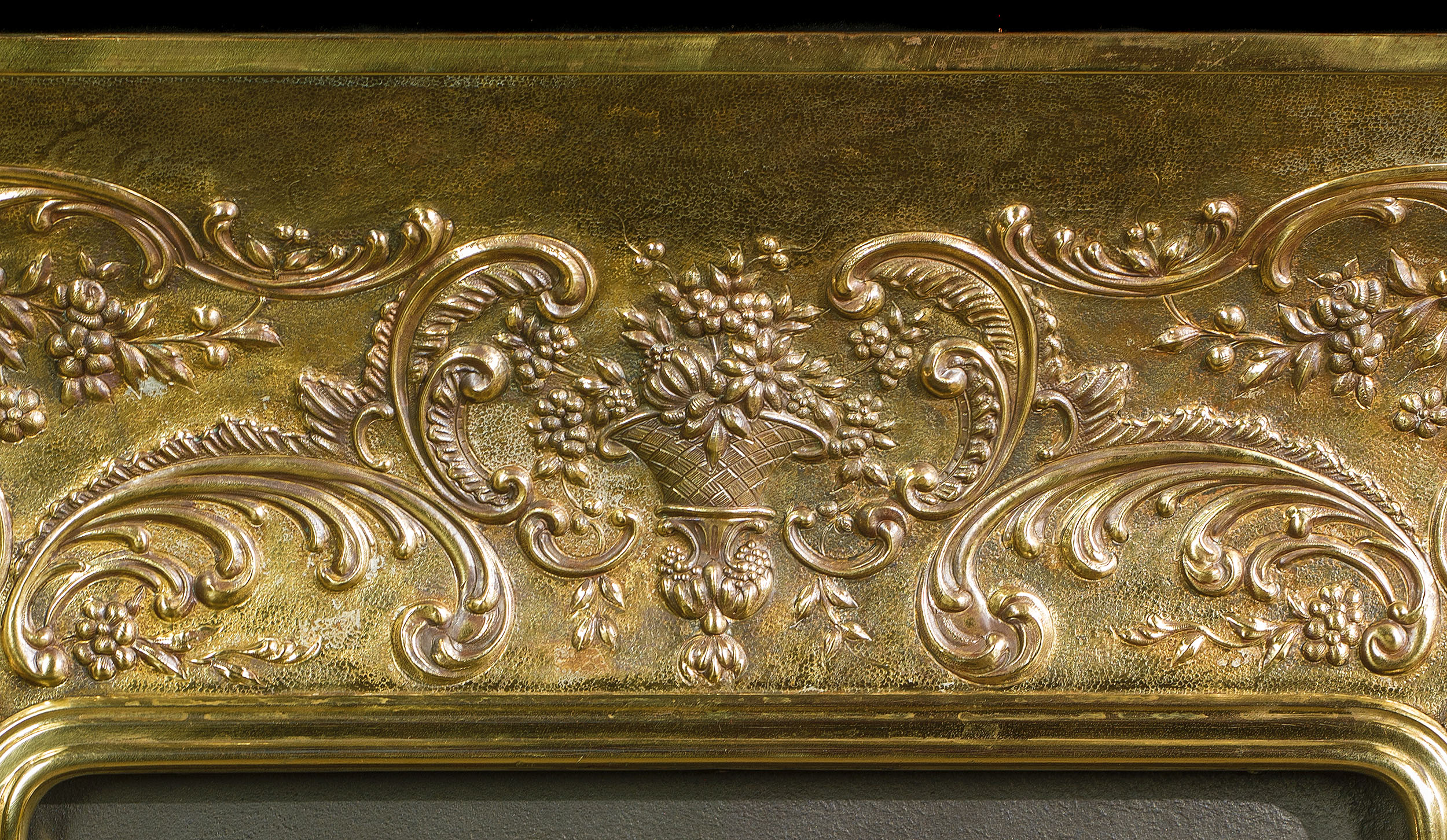 A Louis XIV Style Repousse Brass Insert