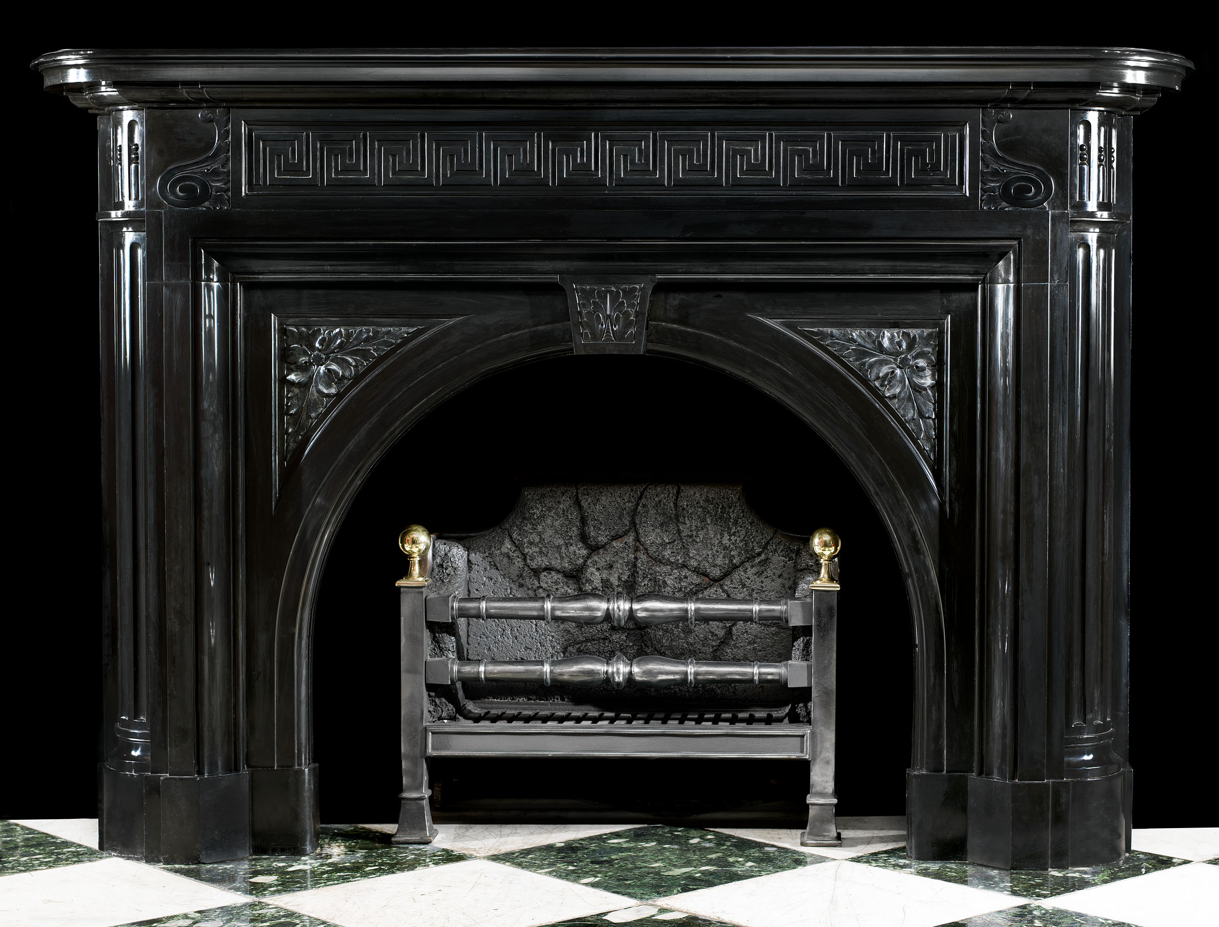 An antique Belgian Black Marble Regency Fireplace Surround 