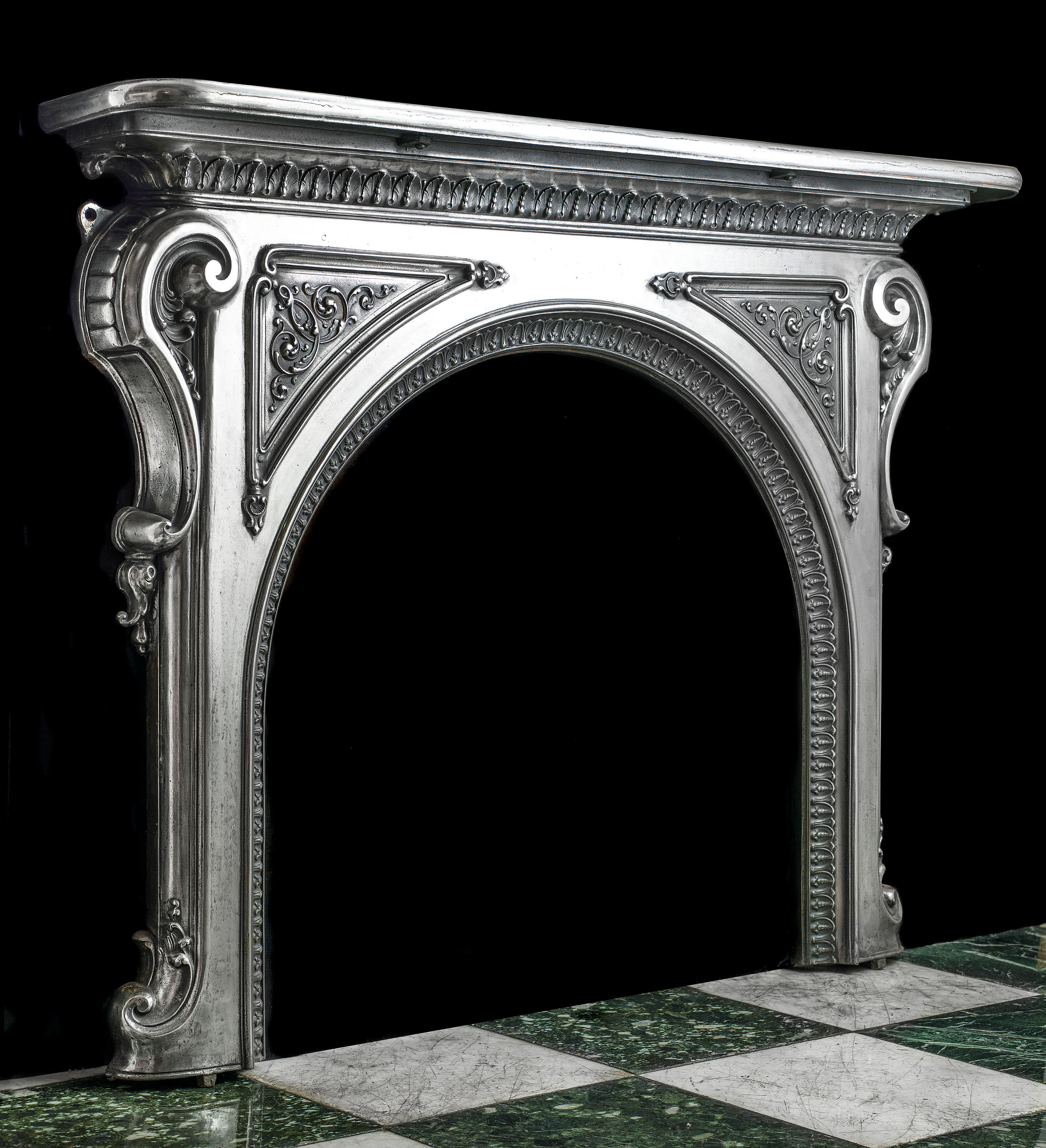 A Cast Iron Rococo Style Fireplace Mantel