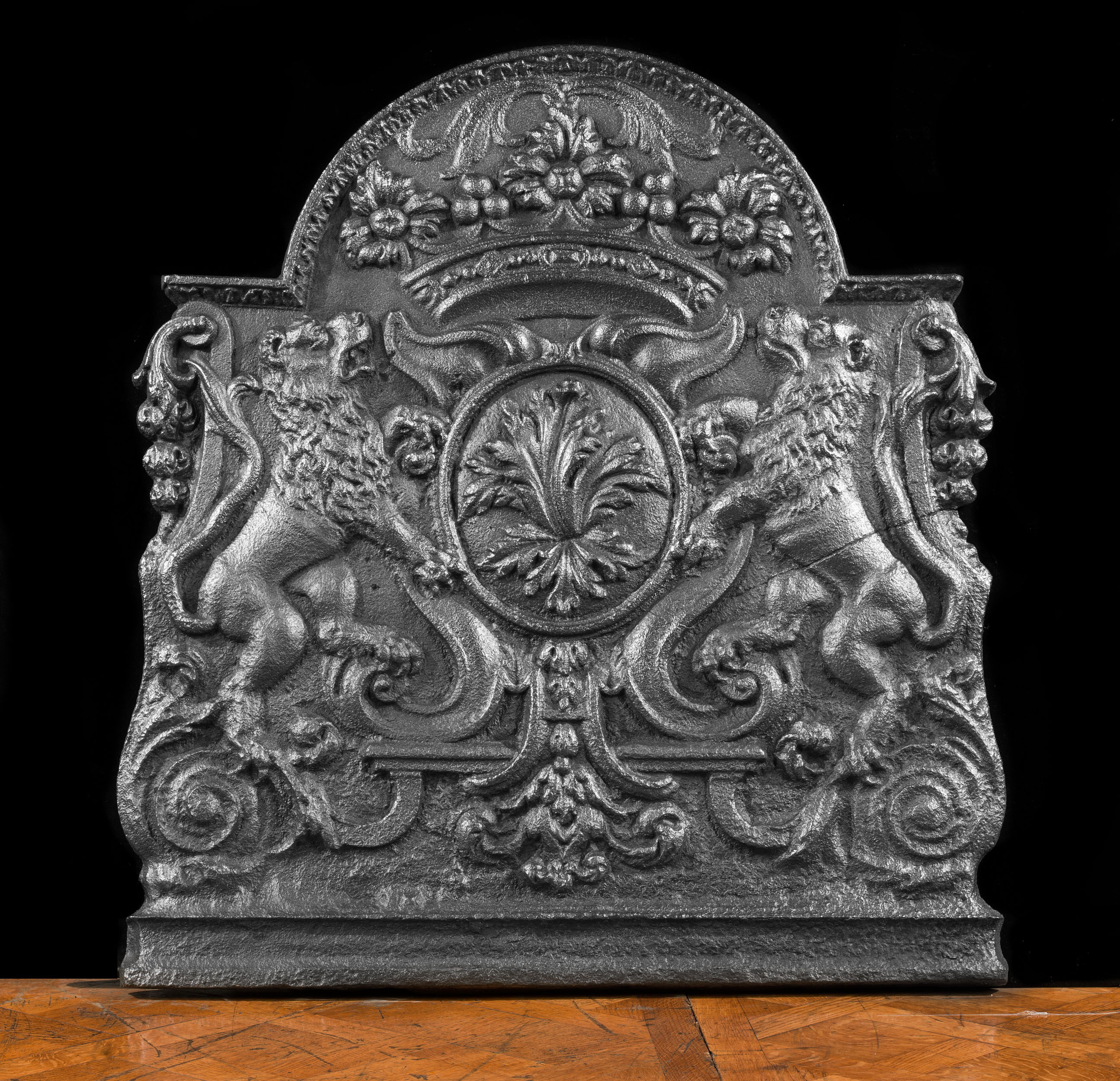 A French antique cast iron fire back.