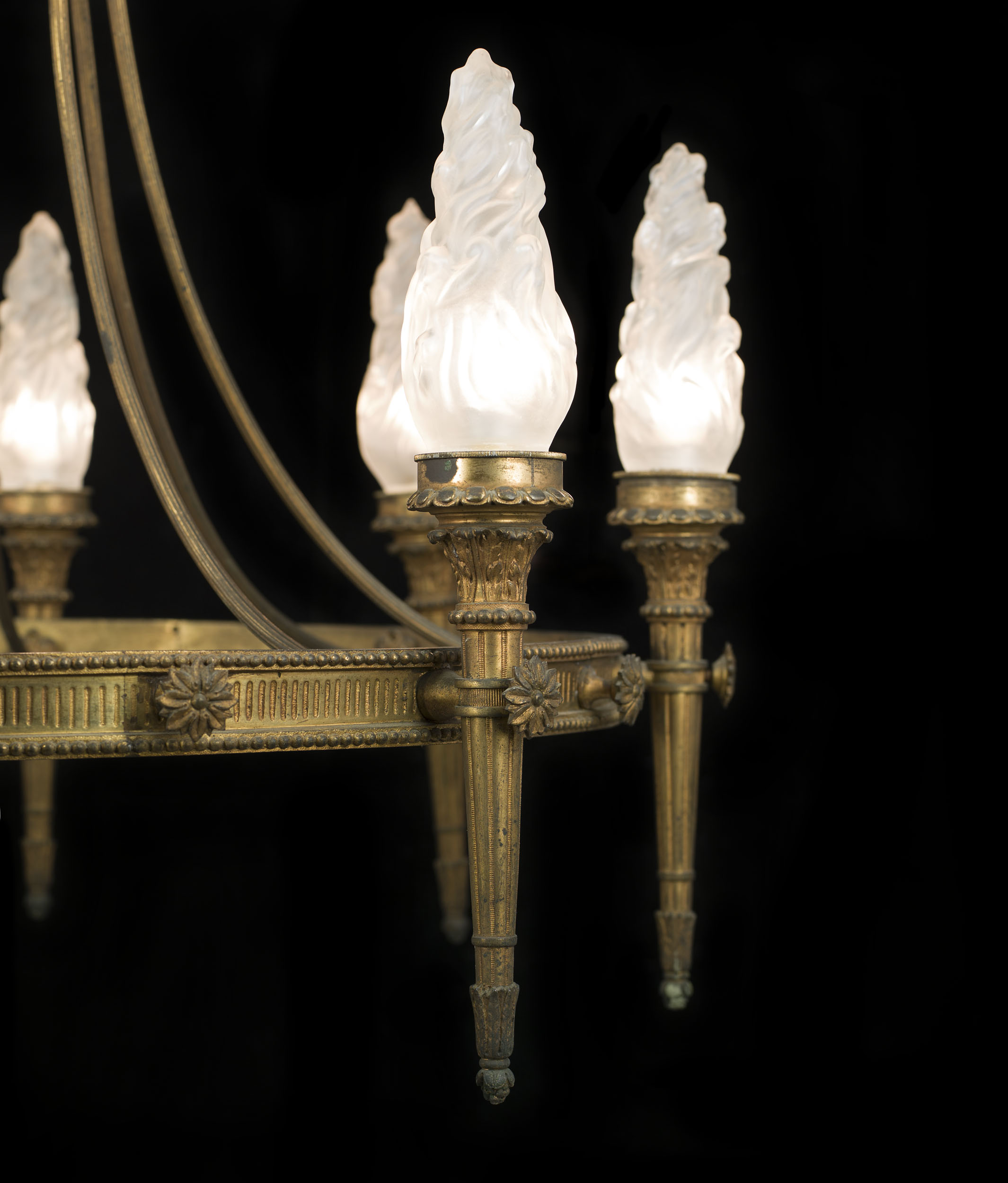 A Neoclassical Style Brass Torchere Chandelier