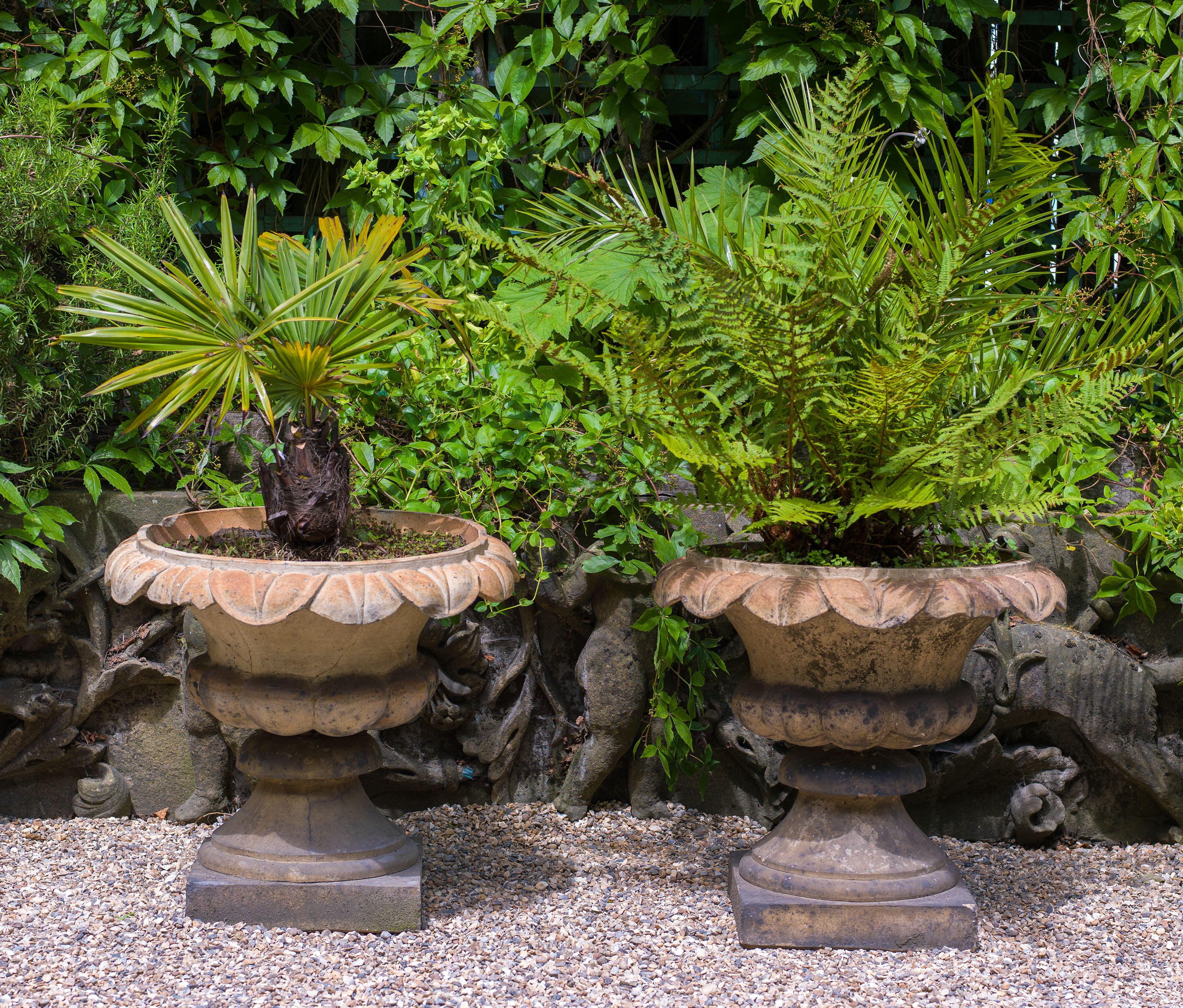 Victorian pair of terracotta garden urns in the Regency style.    
