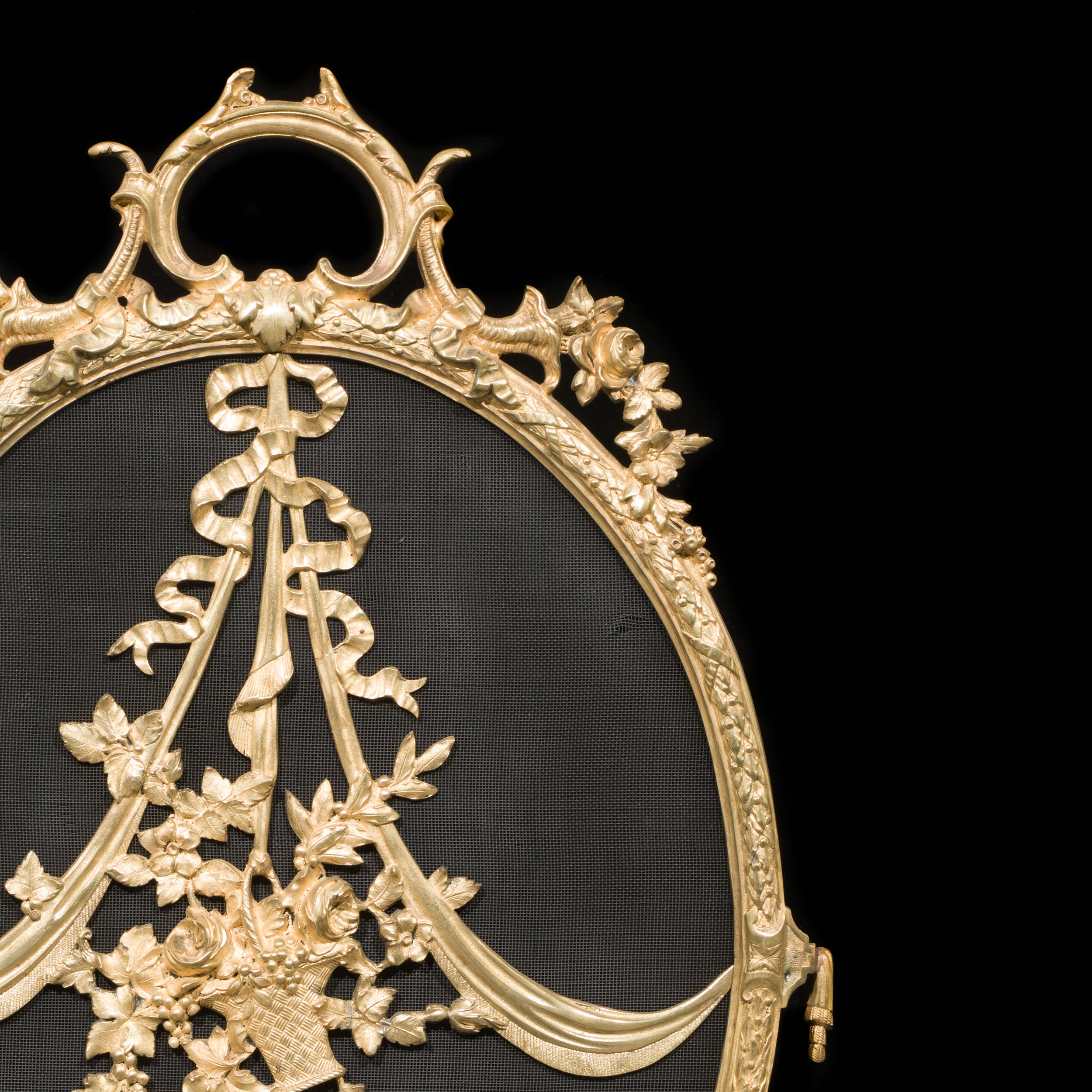 A large French brass Rococo firescreen.