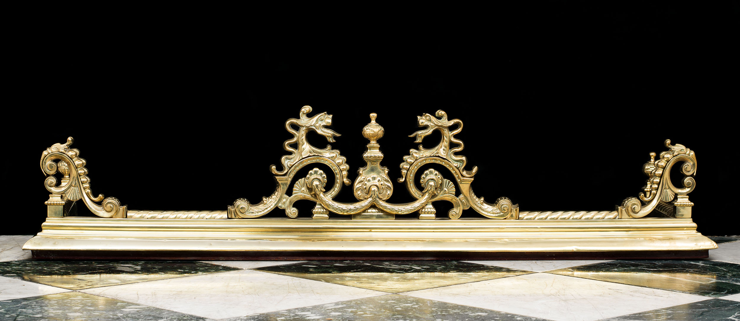A Rococo Style Brass Fireplace Fender 