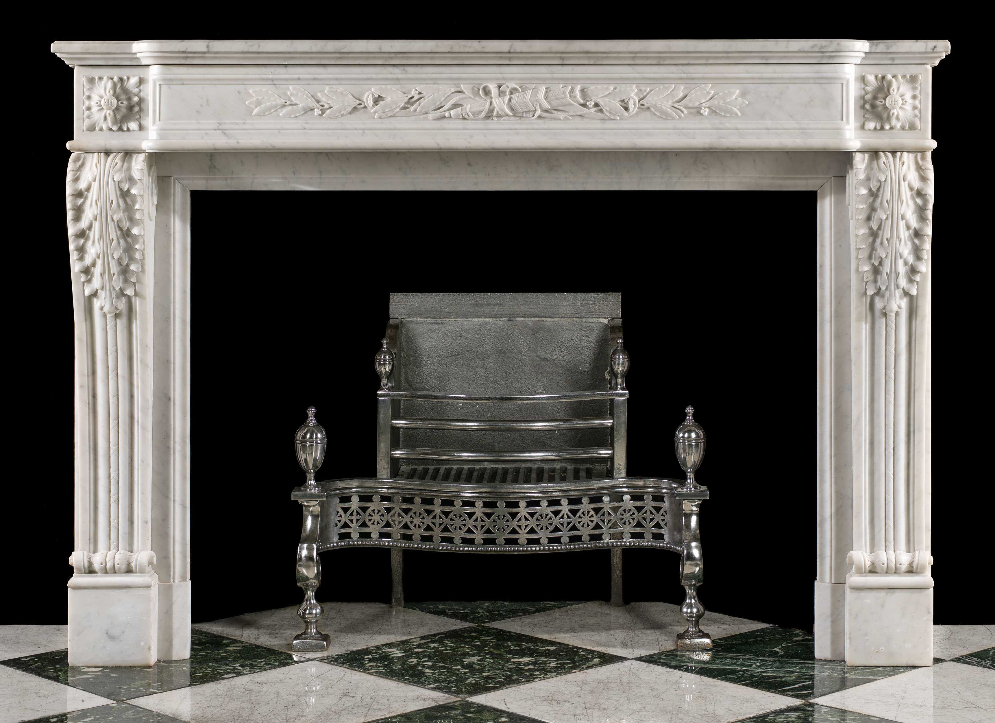 An antique Louis XVI style fireplace mantel