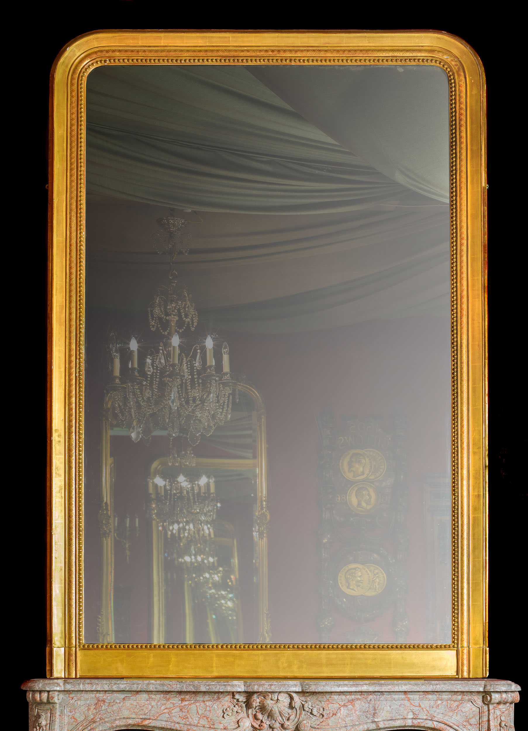 A Tall Victorian Giltwood Overmantel Mirror