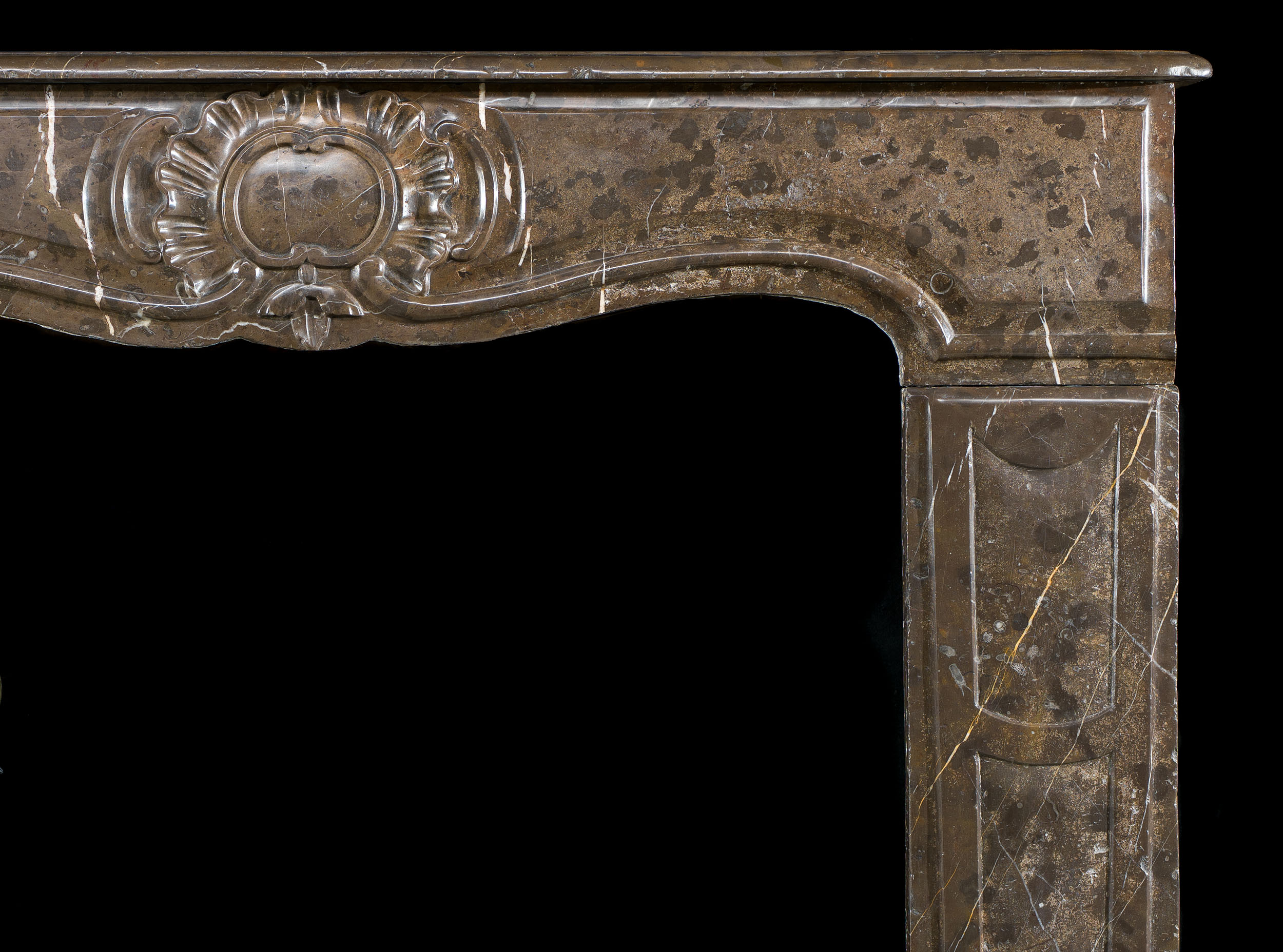  A French Rococo Brown Marble Fireplace