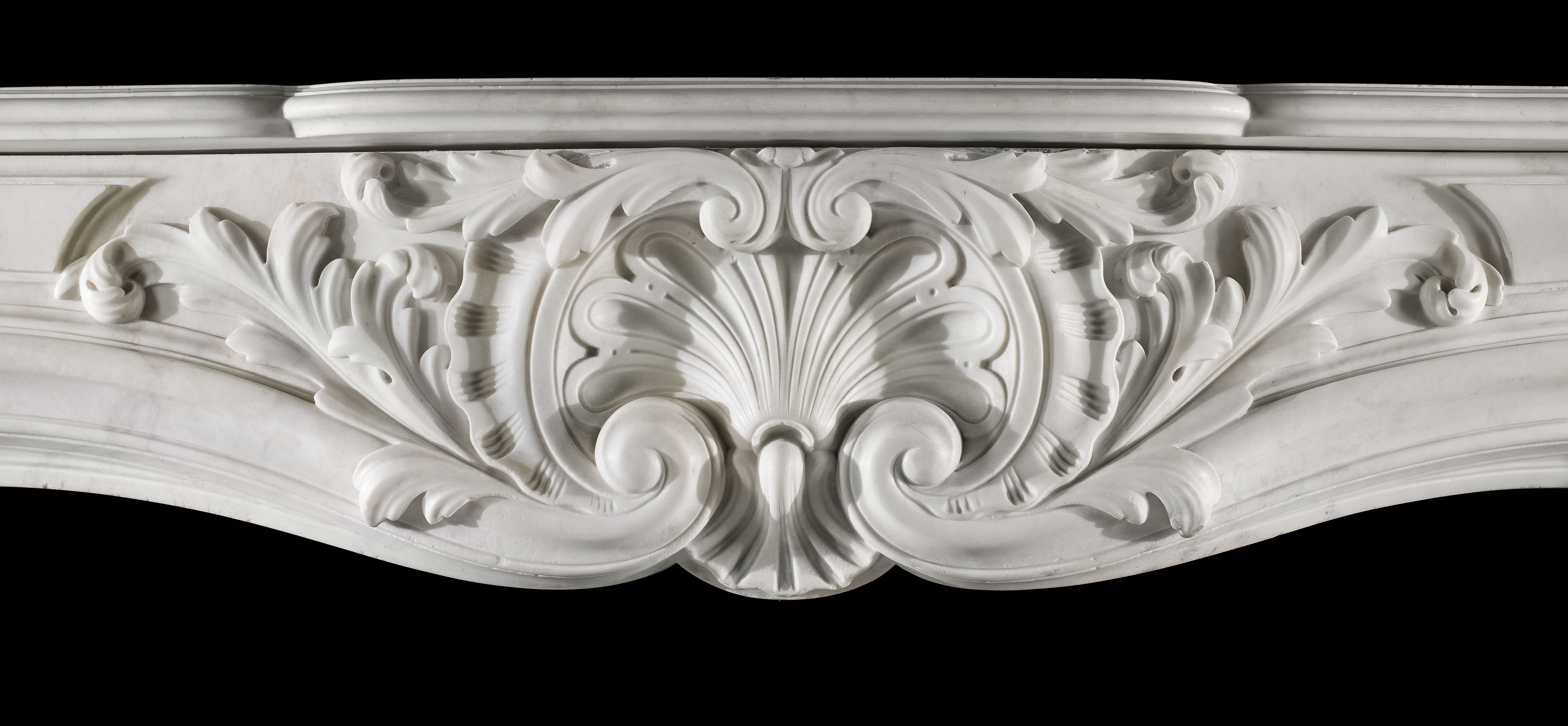 A French Rococo antique marble chimneypiece mantel