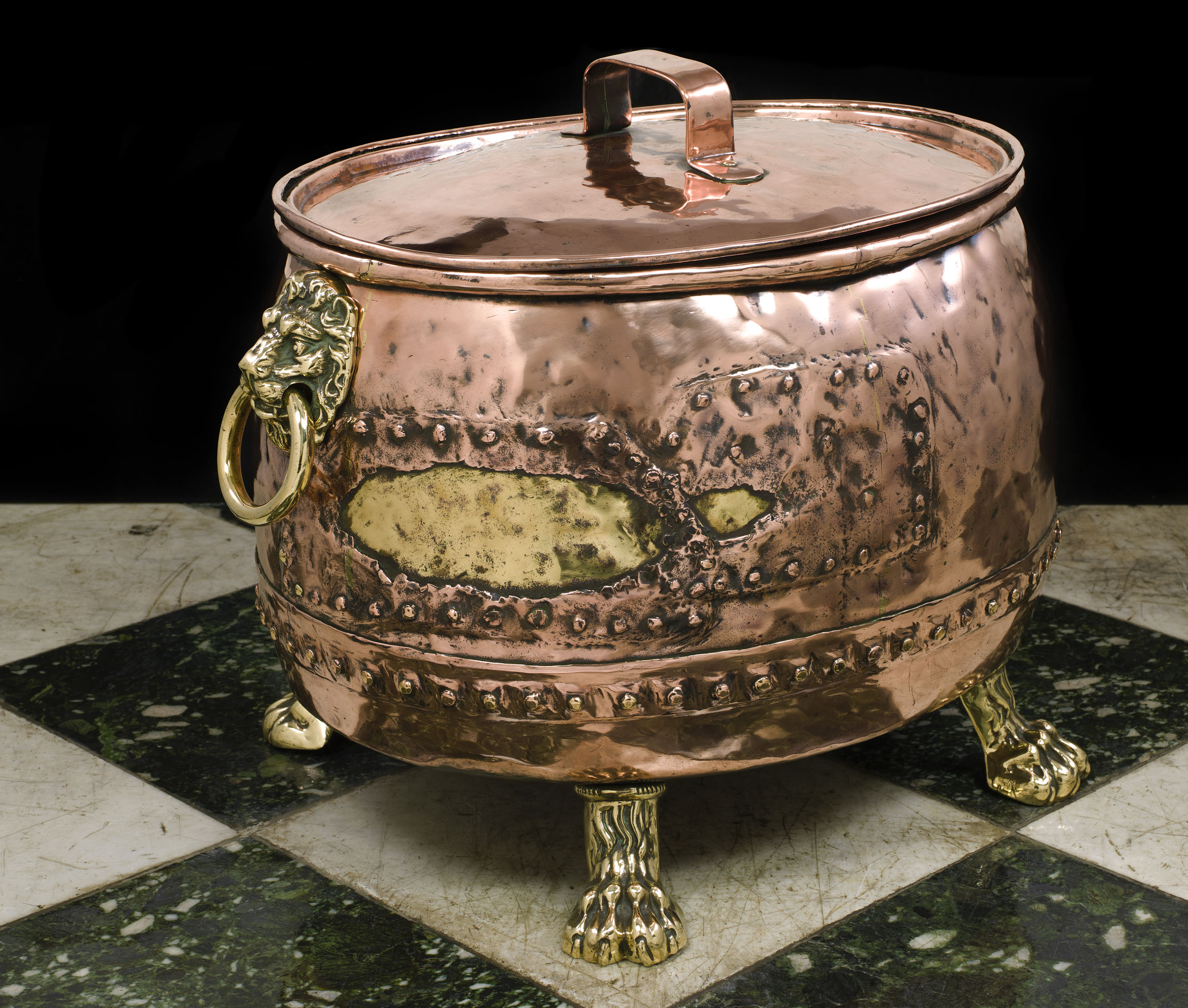 An antique Georgian copper log bin and cover 