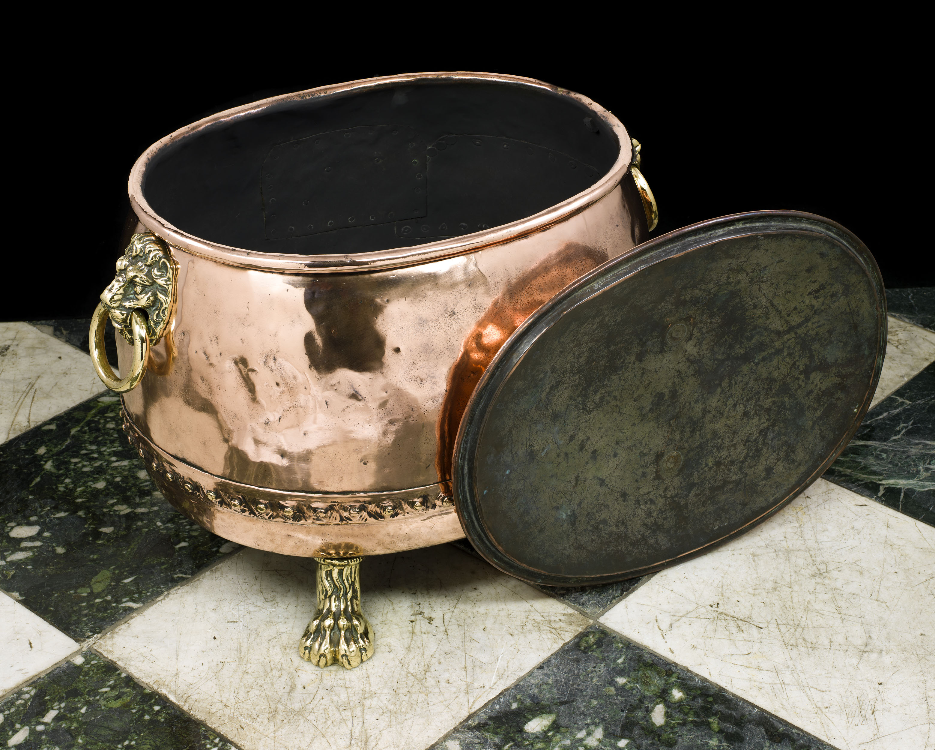 An antique Georgian copper log bin and cover 