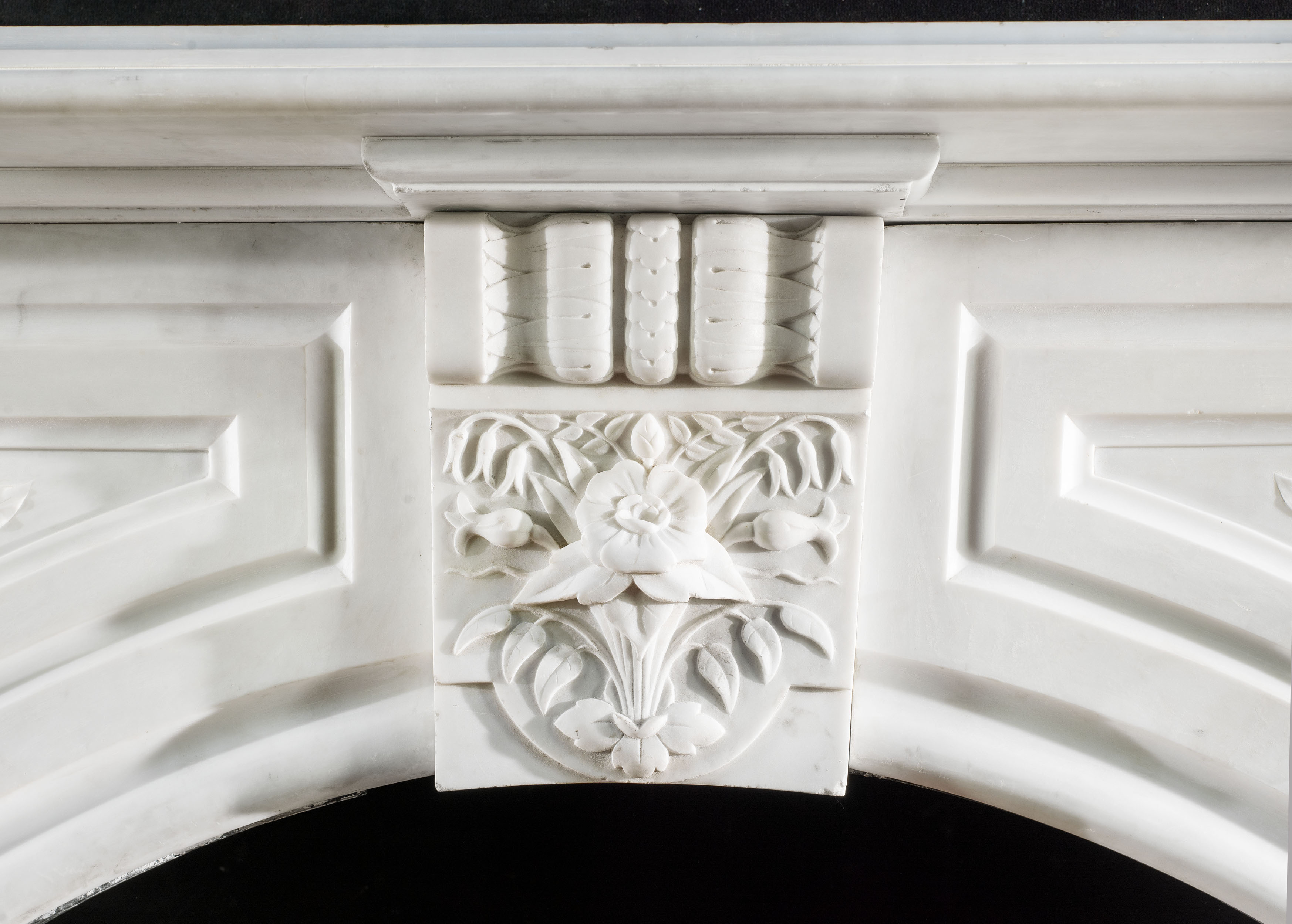 A Victorian arched marble antique fireplace 