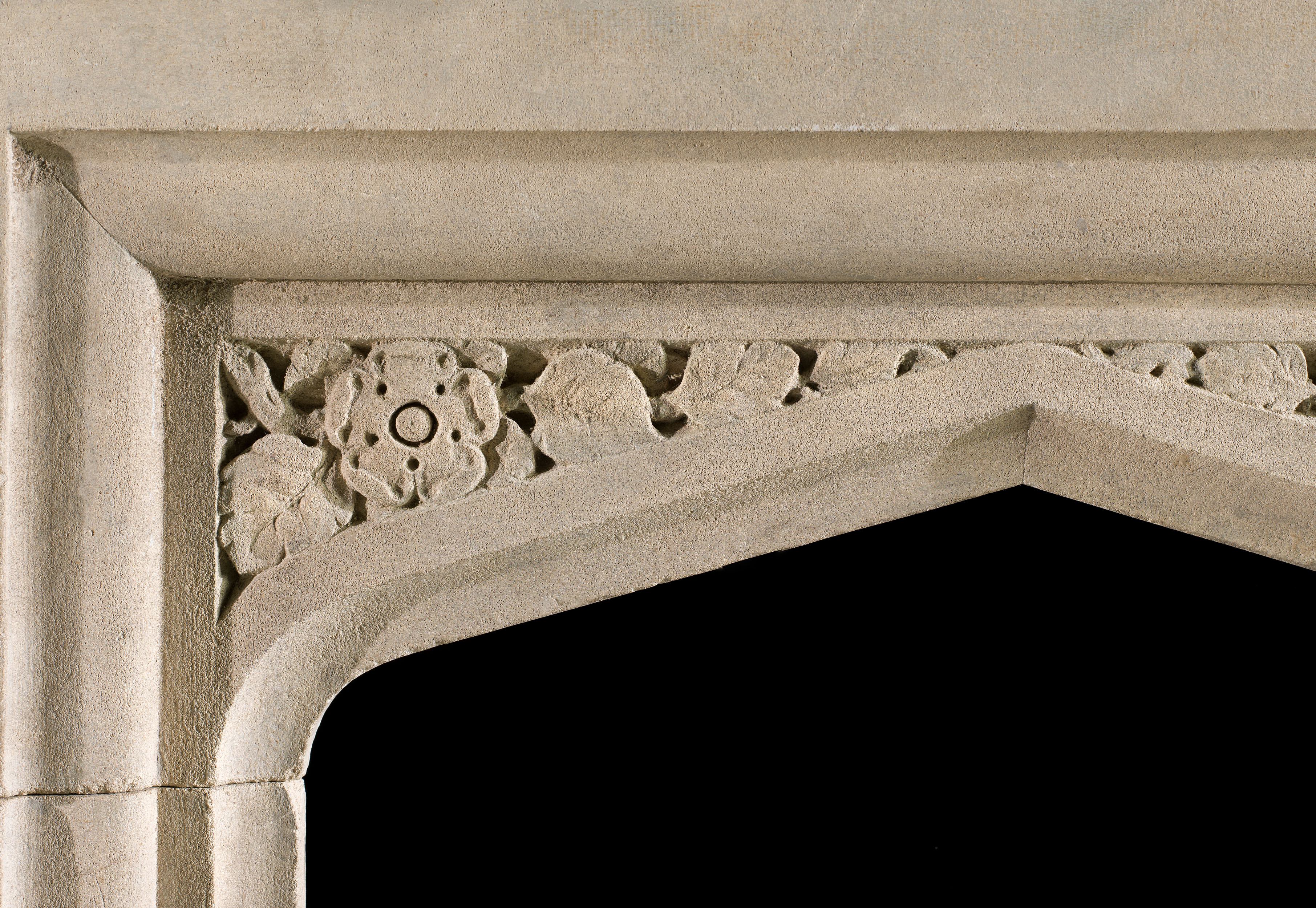 A Tudor Revival antique Victorian limestone fireplace mantel    