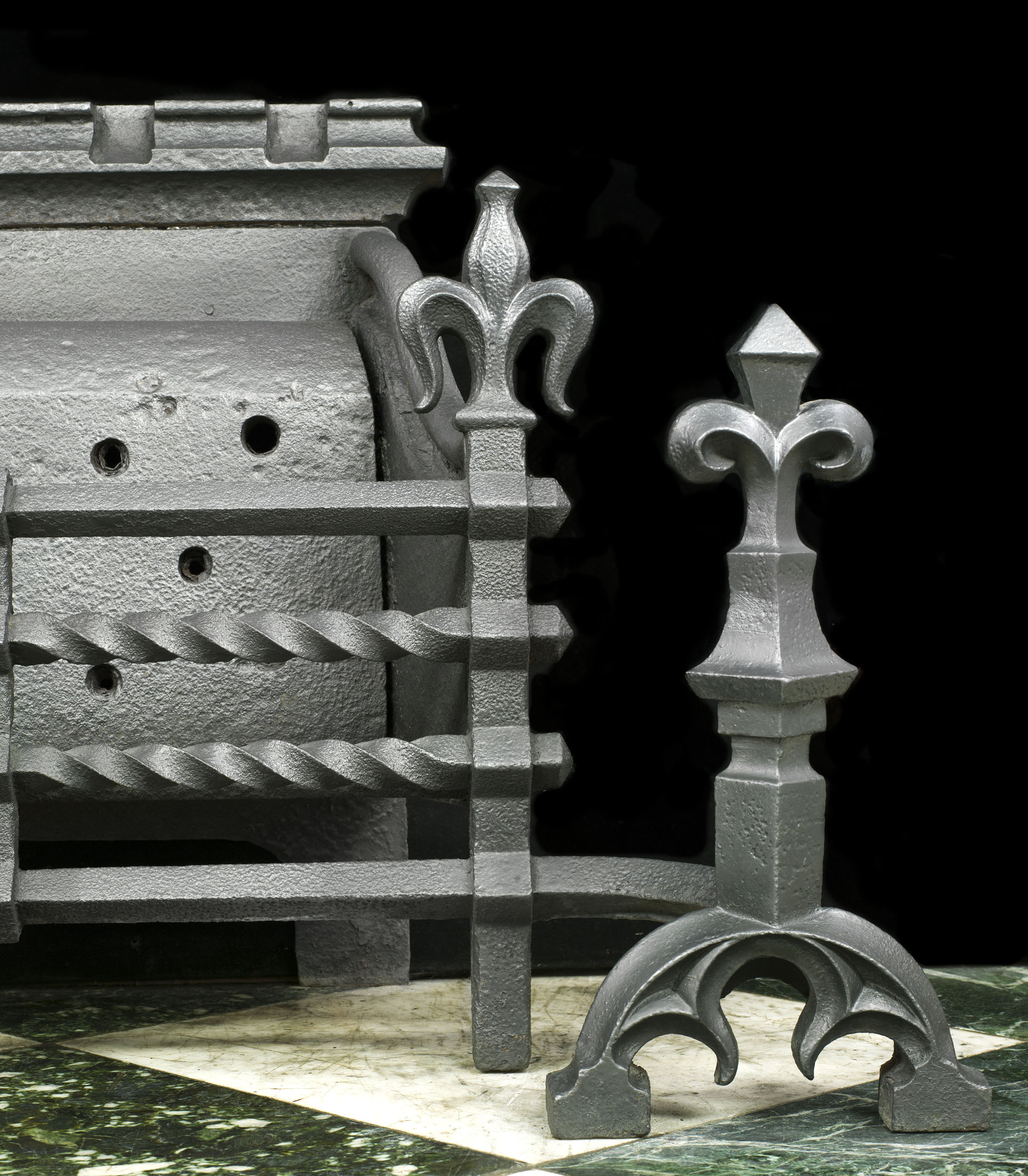 A Large Gothic Style Cast Iron Fire Grate 