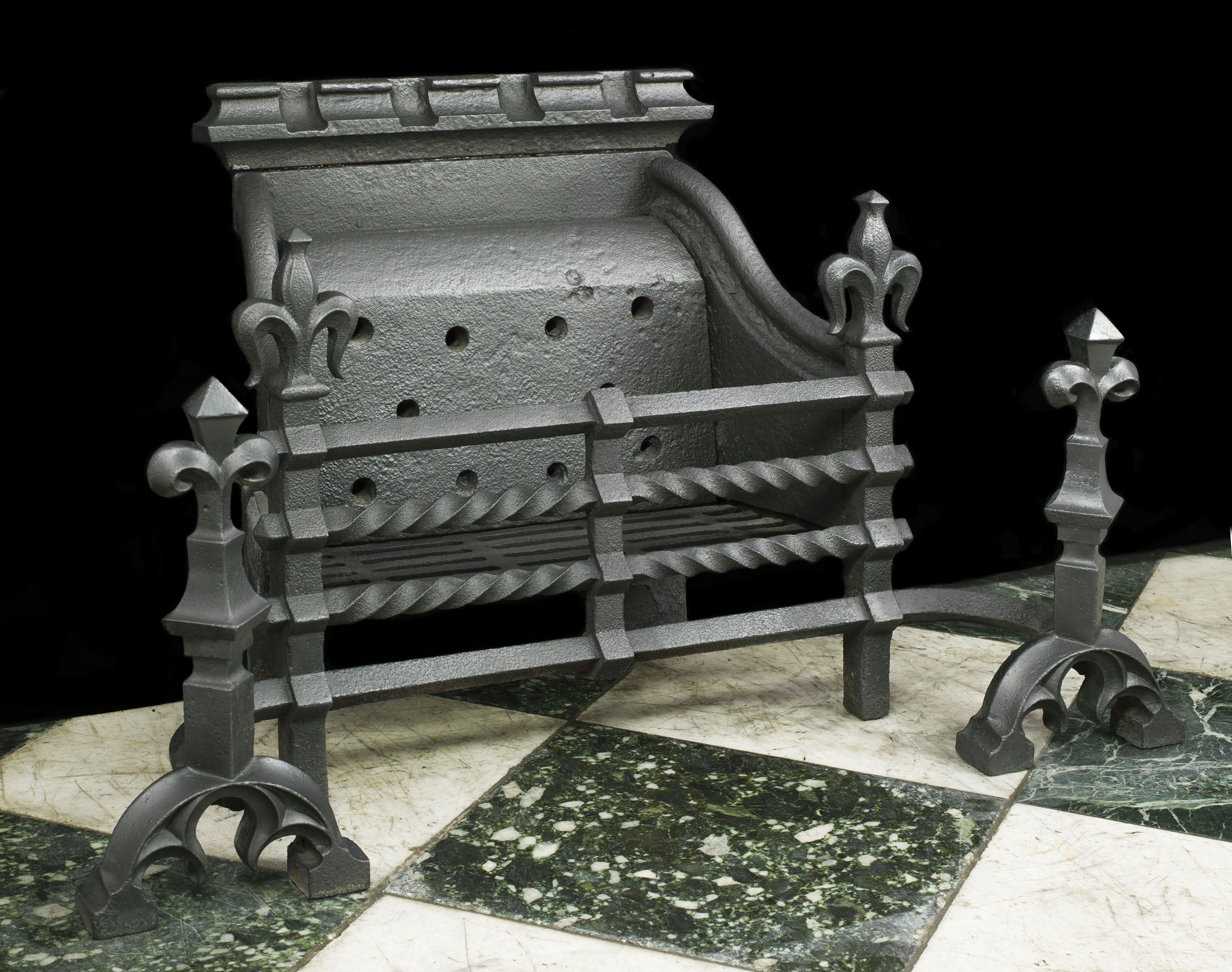 A Large Gothic Style Cast Iron Fire Grate 