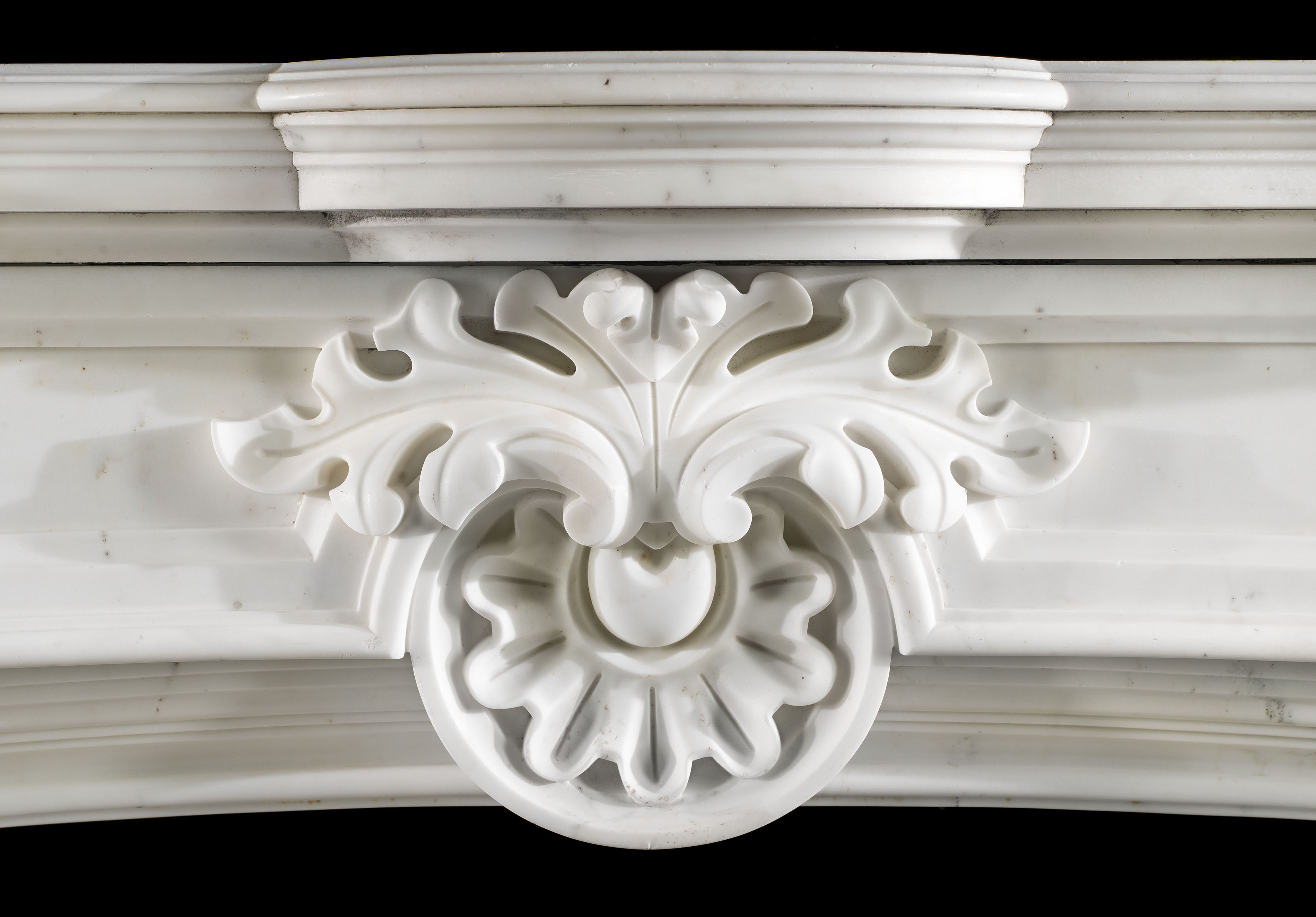 A Statuary Baroque Style Fireplace Mantel
