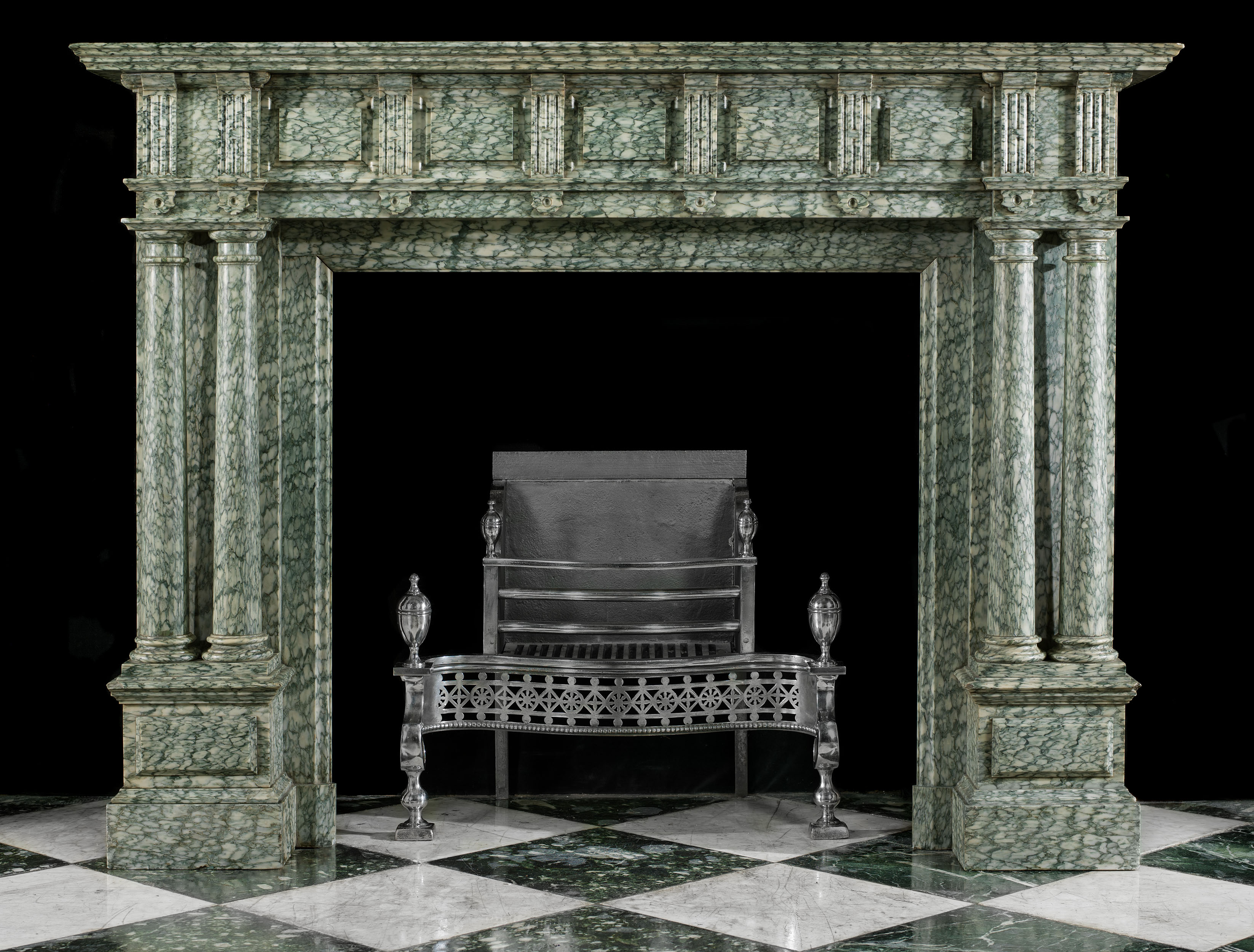 A substantial, columned antique chimneypiece in the Palladian style