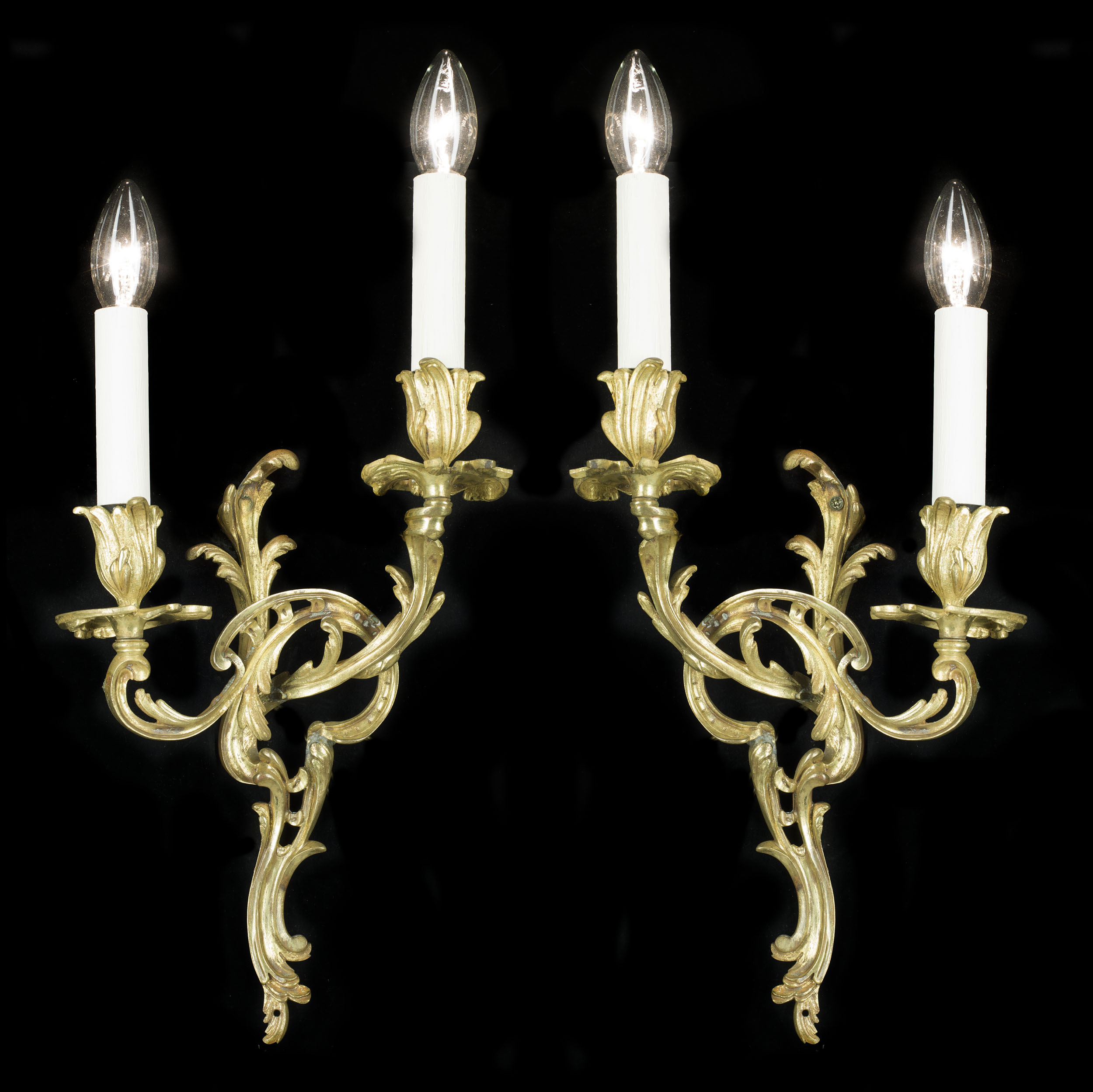 A Rococo Revival Pair of Brass Wall Lights
