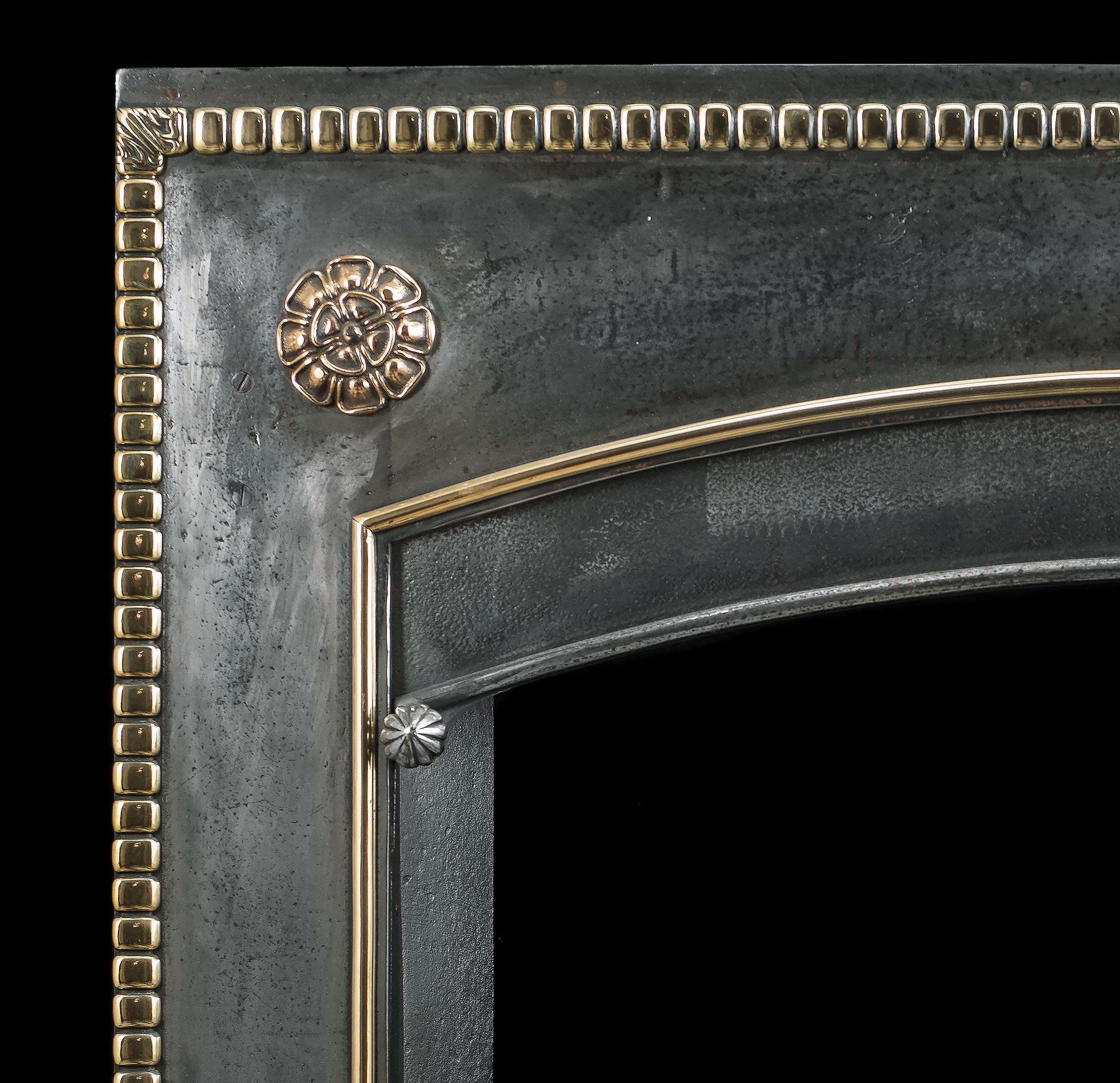 A Bronze & Cast Iron Regency Register Grate