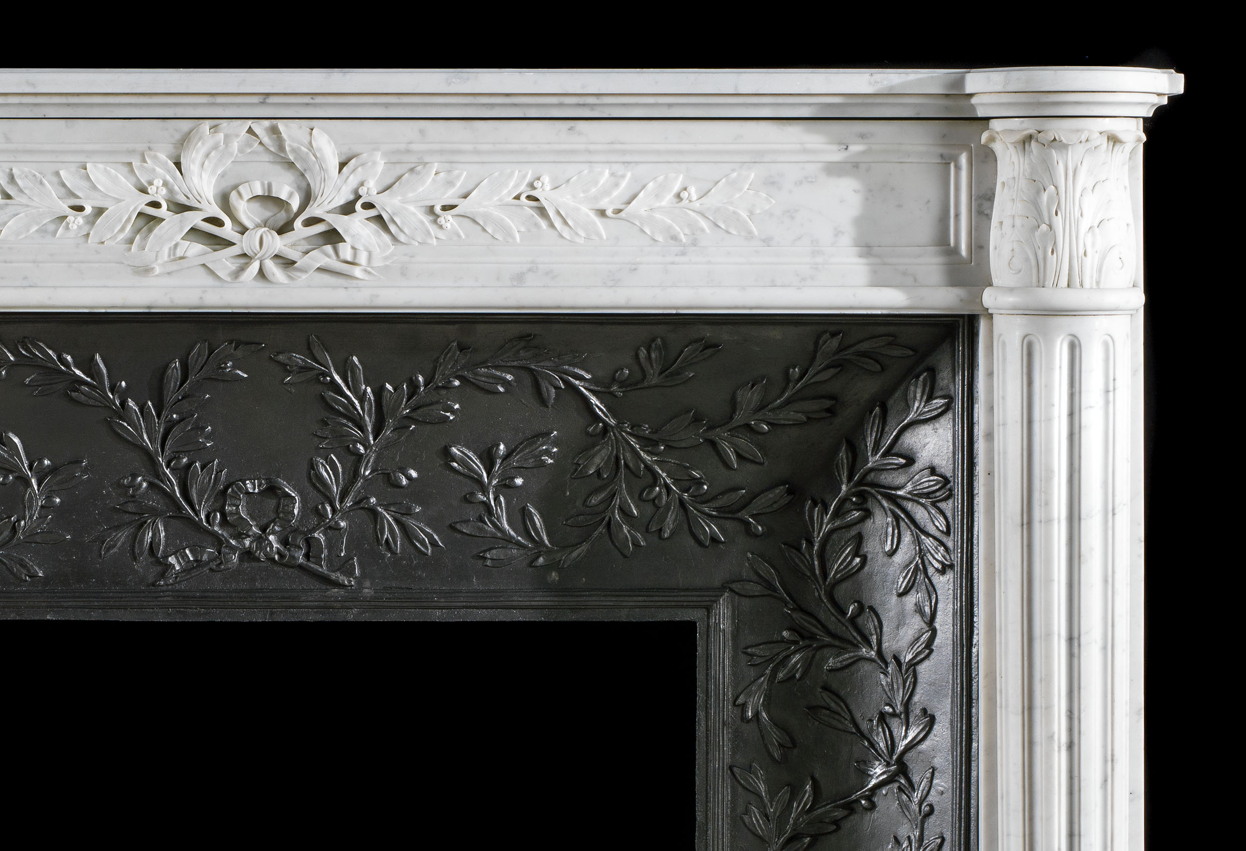 A Louis XVI style Carrara Fireplace